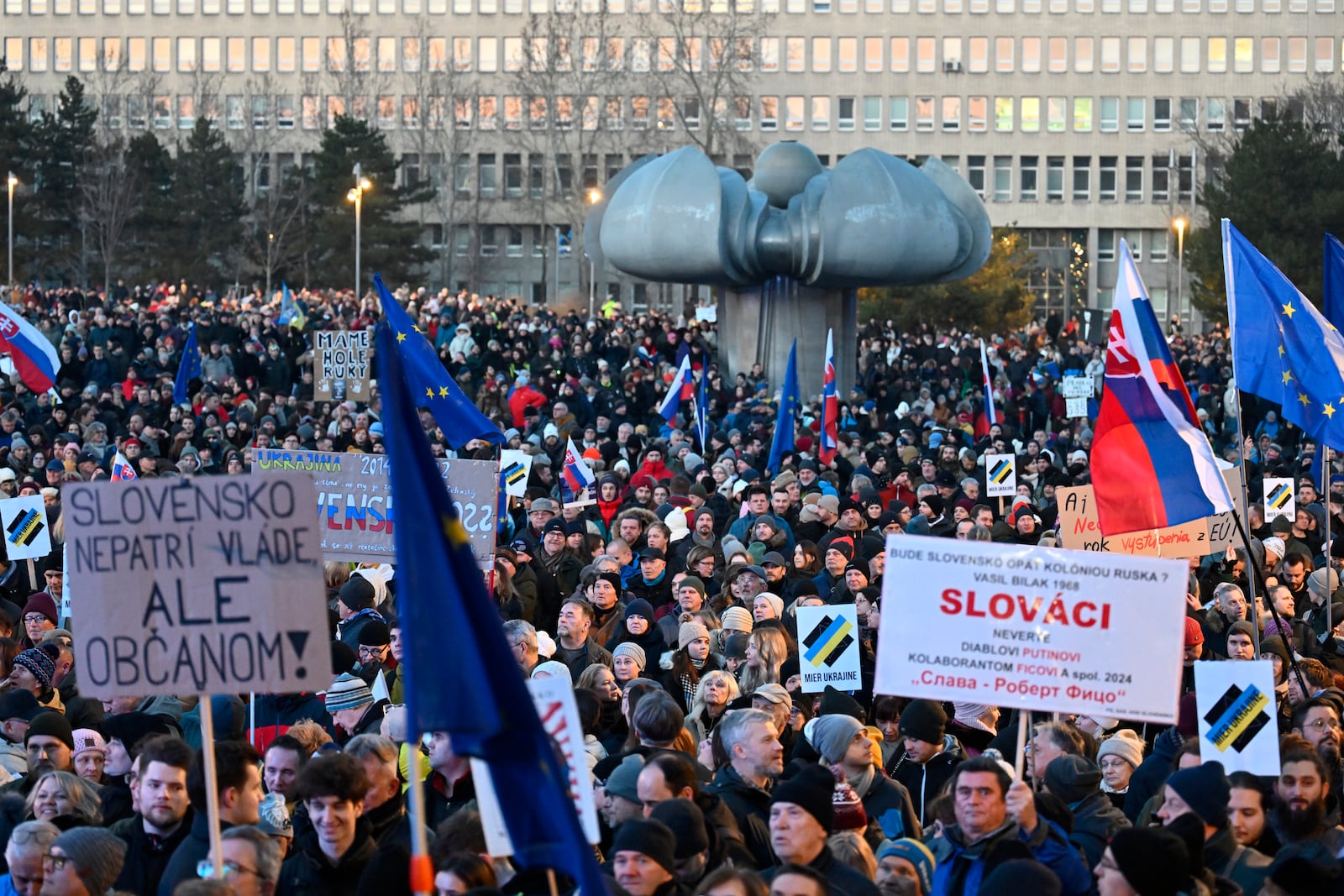 Thousands of protesters gather to oppose the policies of Slovakia's Prime Minister Robert Fico in Bratislava, Slovakia, Friday, Jan. 24, 2025. (AP Photo/Denes Erdos)