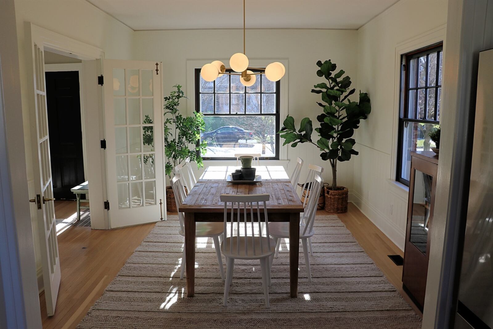 The threshold between the dining room and kitchen has been enlarged to create a more open feel between the two spaces. 