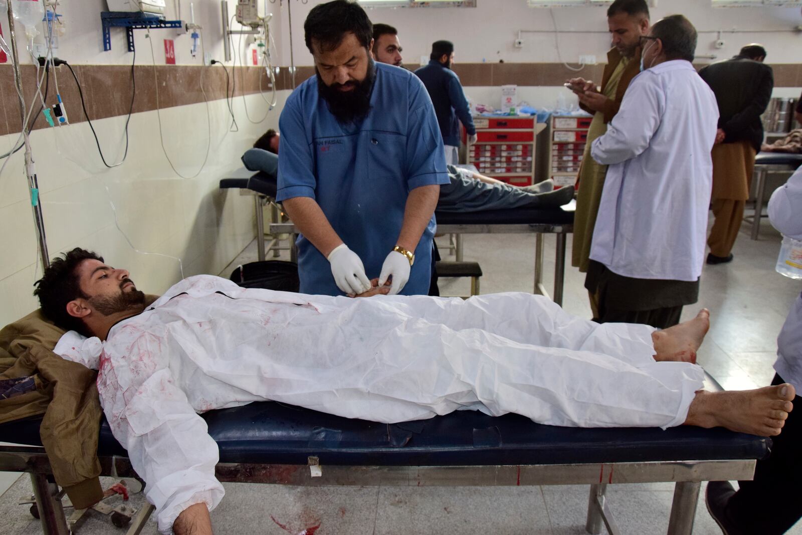 Injured victim of a roadside bomb explosion receives treatment at hospital in Quetta, Pakistan, Friday, Feb. 28, 2025. (AP Photo/Arshad Butt)