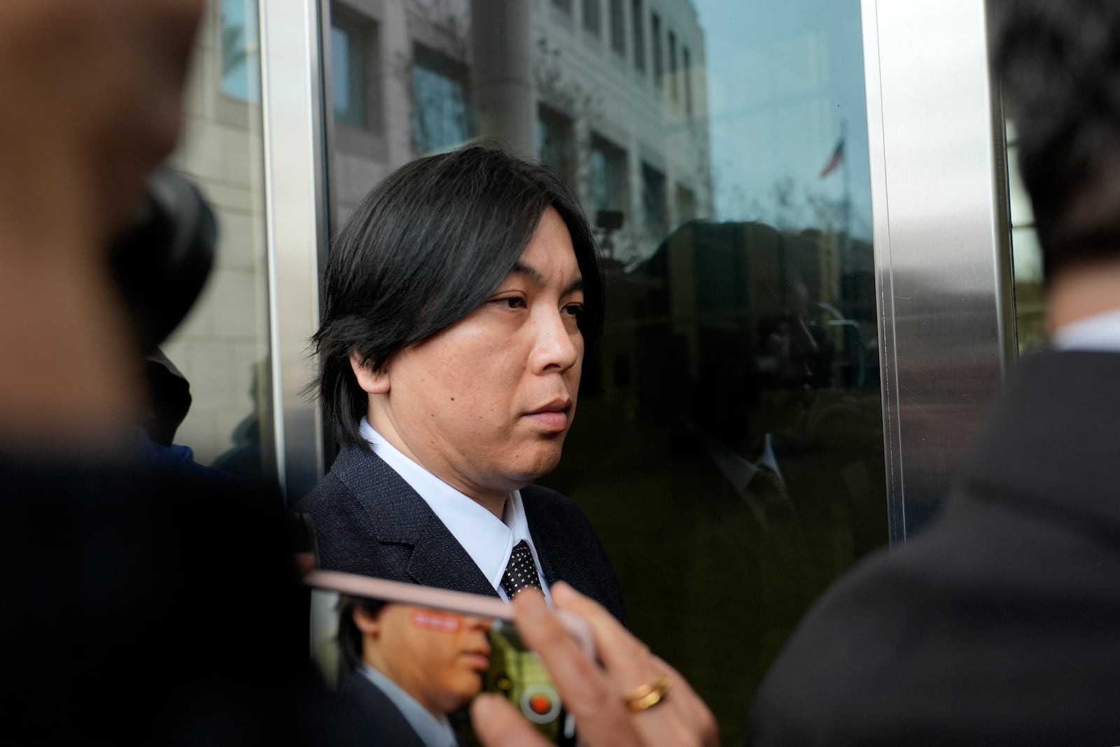 Ippei Mizuhara, former interpreter for Los Angeles Dodgers baseball star Shohei Ohtani expected to be sentenced for bank and tax fraud arrives at federal court on Thursday, Feb. 6, 2025, in Santa Ana, Calif. (AP Photo/Damian Dovarganes)