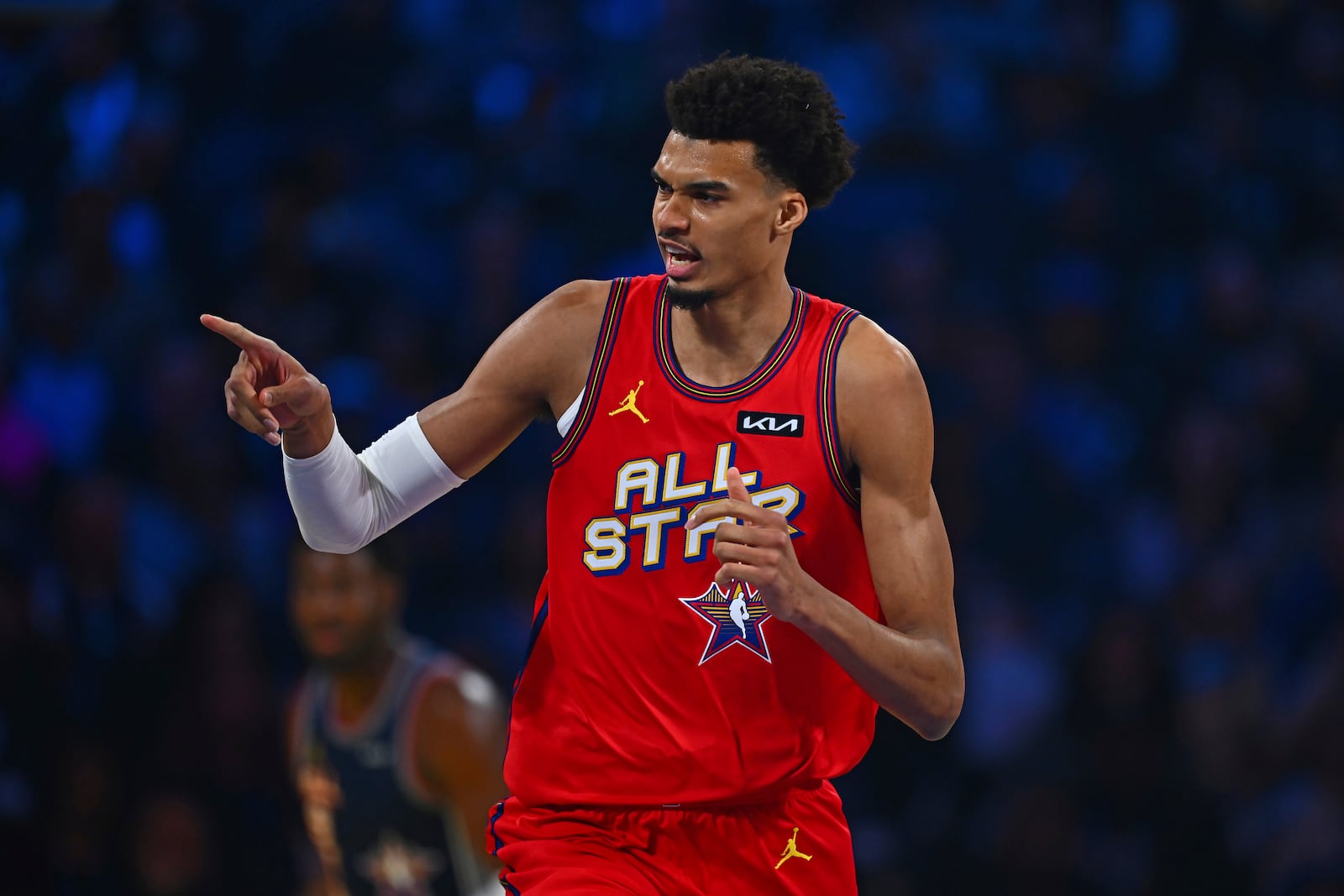 Chuck's Global Stars' Victor Wembanyama (1) gestures after sinking a basket against the Kenny's Young Stars during Game 1 of the NBA All-Star Game at Chase Center in San Francisco, Sunday, Feb. 16, 2025. (Jose Carlos Fajardo/Bay Area News Group via AP)