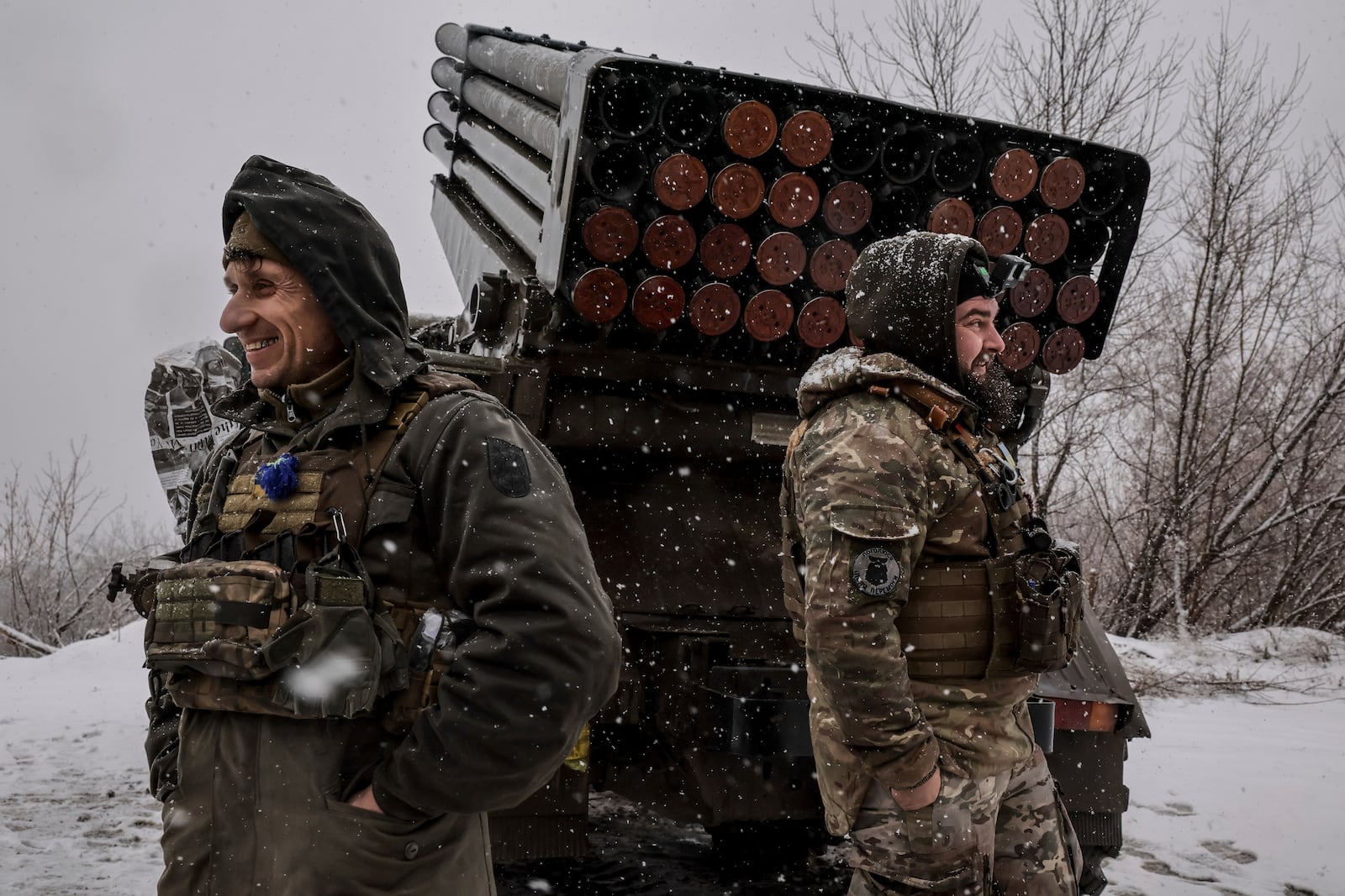 In this photo provided by Ukraine's 24th Mechanised Brigade press service, Ukrainian servicemen prepare to fire an MRLS BM-21 'Grad' towards Russian army positions near Chasiv Yar, Donetsk region, Ukraine, Saturday, Feb. 15, 2025. (Oleg Petrasiuk/Ukraine's 24th Mechanised Brigade via AP)