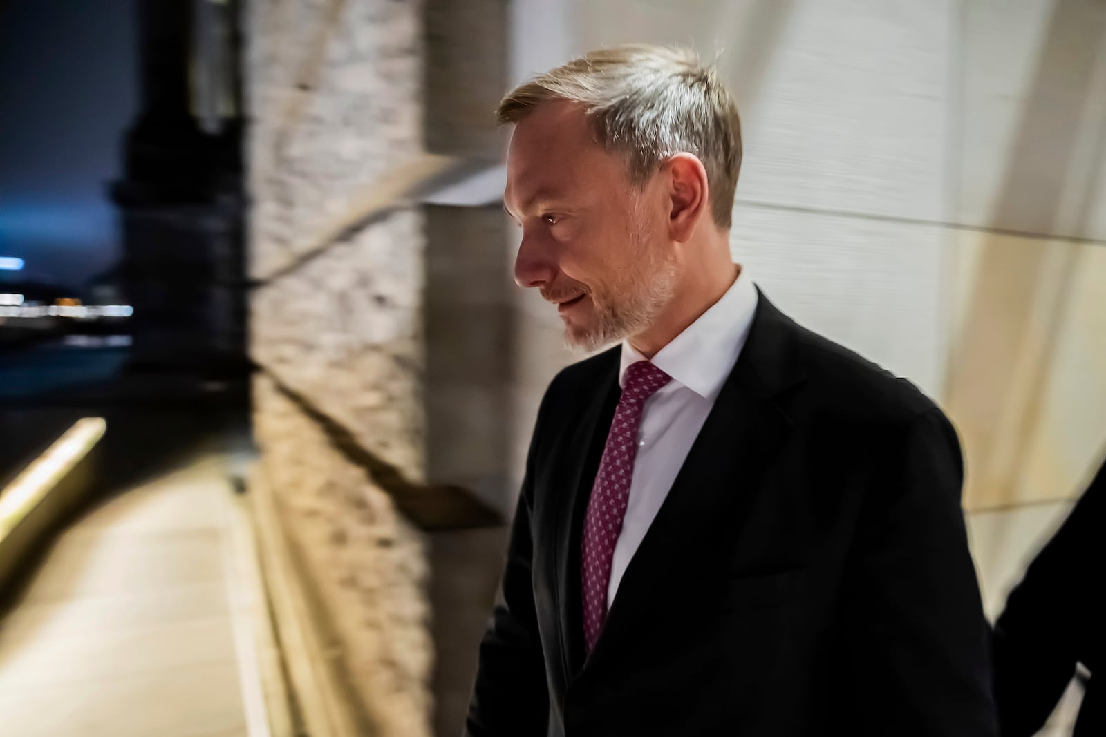 Federal Minister of Finance Christian Lindner leaves the Reichstag building after a parliamentary group meeting following his dismissal by the Federal Chancellor Olaf Scholz, in Berlin, Wednesday, Nov. 6, 2024. (Christoph Soeder/dpa via AP)