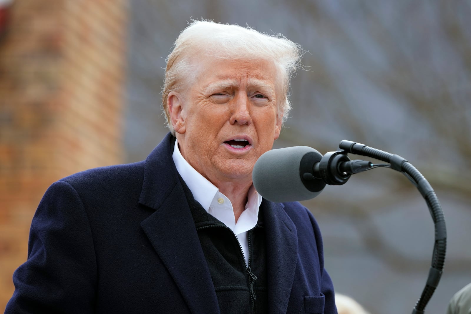 President Donald Trump speaks as he meets with homeowners affected by Hurricane Helene in Swannanoa, N.C., Friday, Jan. 24, 2025. (AP Photo/Mark Schiefelbein)