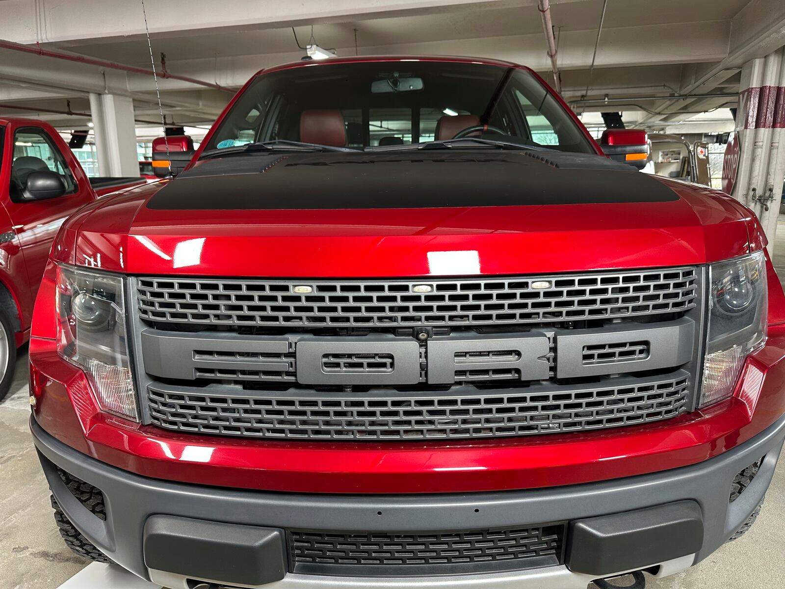 A 2014 Ford F-150 SVT Raptor, part of Ford Motor Co.'s Heritage Fleet, is on display Wednesday, March 12, 2025, in Dearborn, Mich. (AP Photo/Mike Householder)