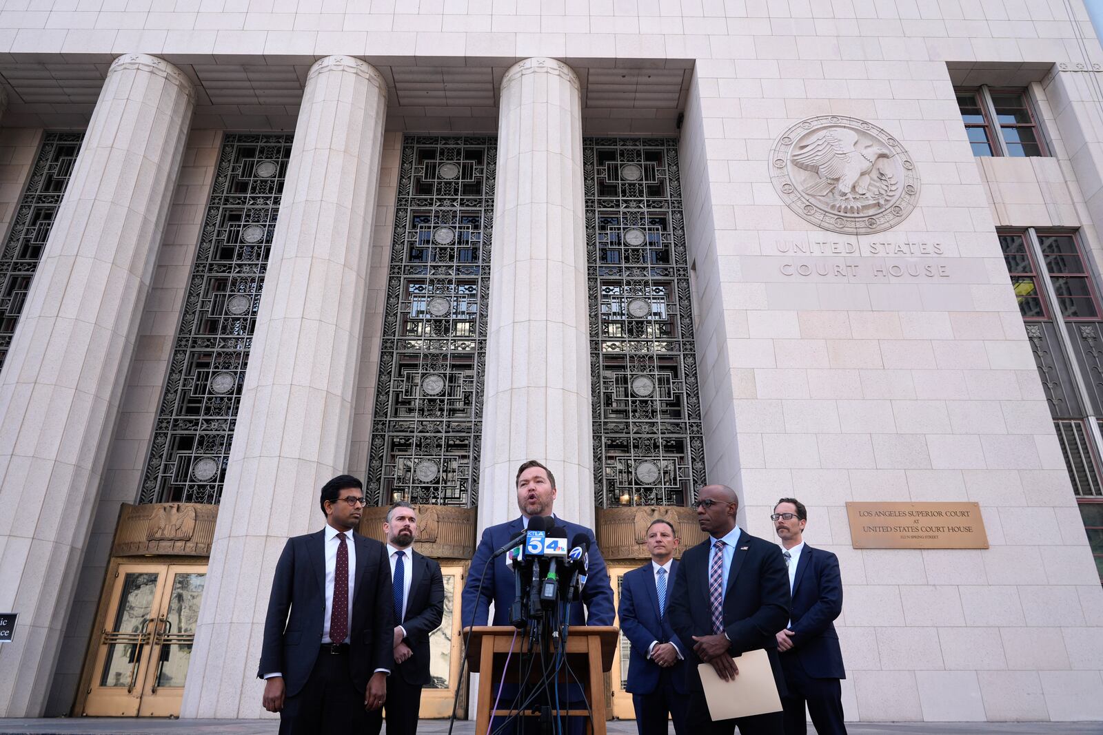 Acting U.S. Attorney Joseph T. McNally, talks during a news conference to discuss court filings related to the Palisades Fire investigation outside the U.S. Courthouse in downtown Los Angeles on Friday, Jan. 31, 2025. (AP Photo/Damian Dovarganes)