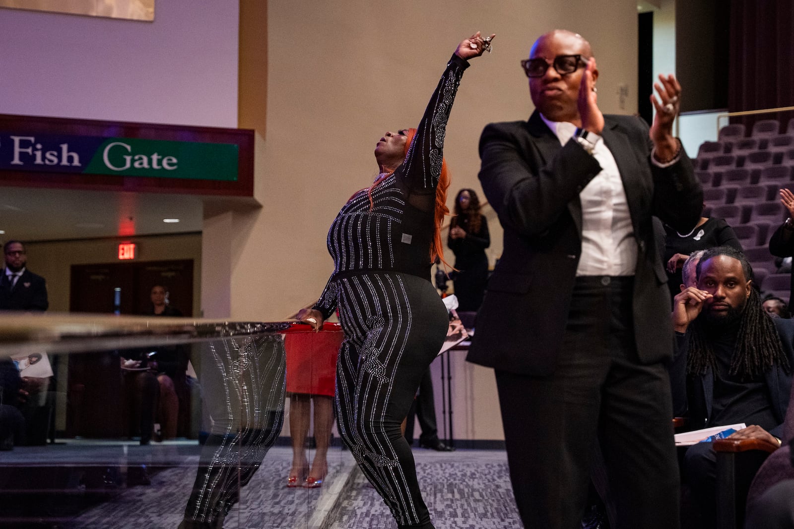 Fans and friends gather to celebrate the life of singer and actress Angie Stone, Friday, March 14, 2025, in Austell. Ga. (AP Photo/Olivia Bowdoin)