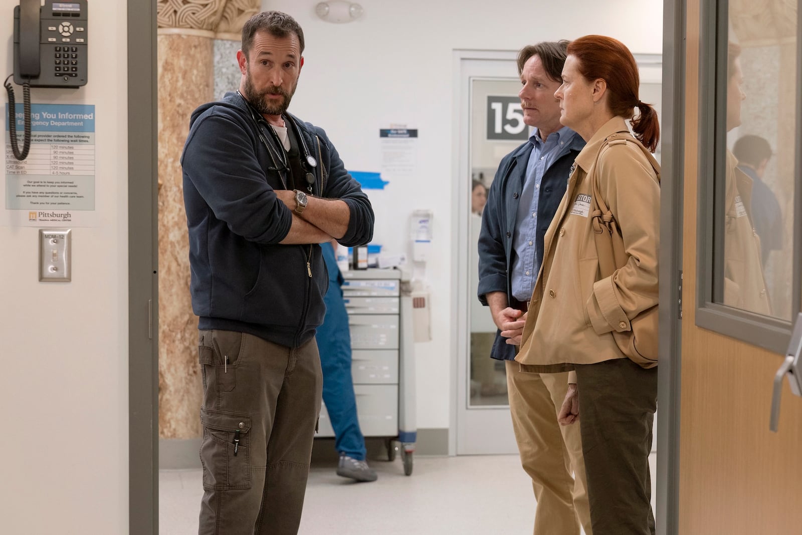 This image released by Max shows Noah Wyle, left, Mackenzie Astin and Rebecca Tilney, right, in a scene from "The Pitt." (Warrick Page/MAX via AP)