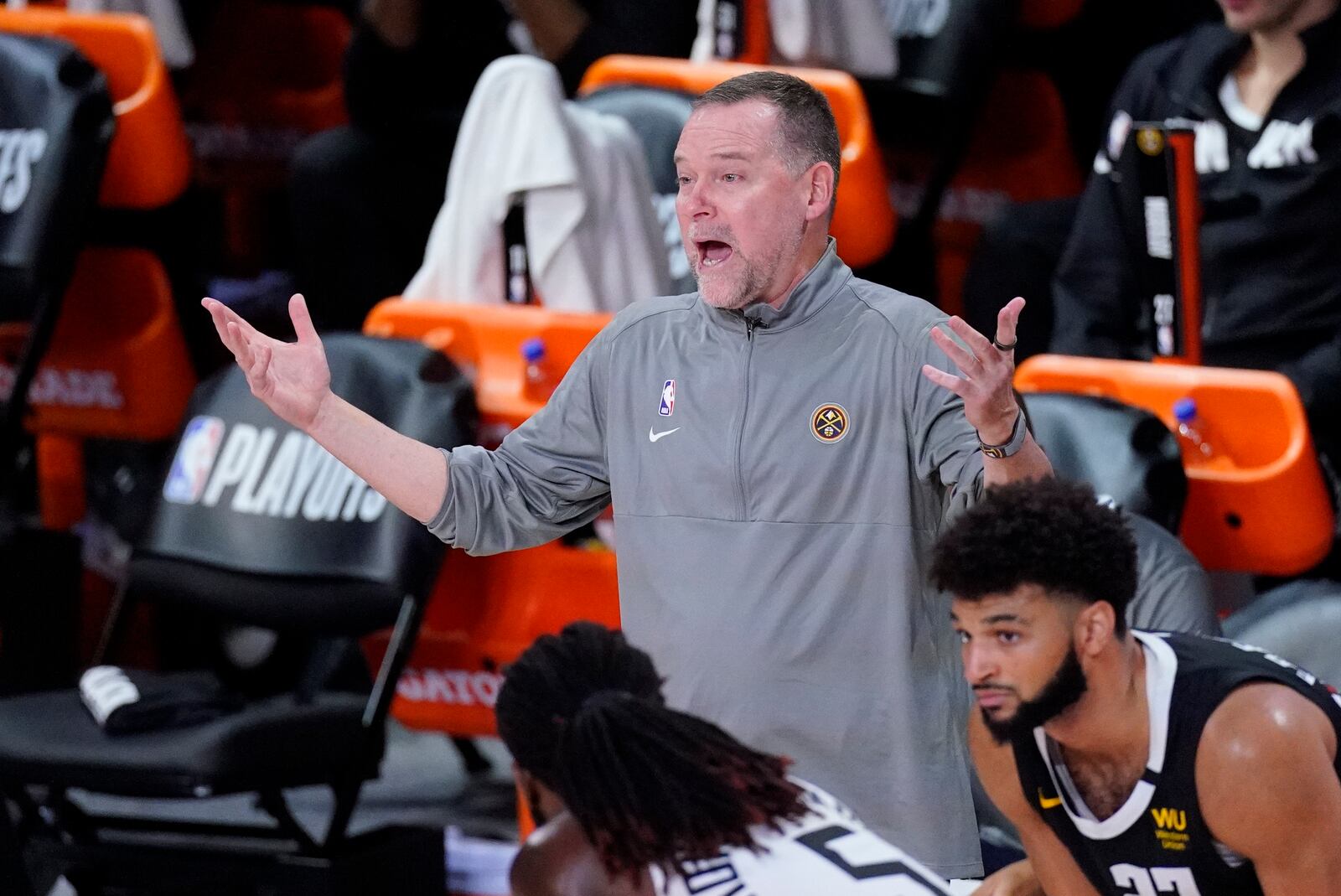 Denver Nuggets head coach Michael Malone complains about a call during the second half of an NBA conference semifinal playoff basketball game against the Los Angeles Clippers, Wednesday, Sept. 9, 2020, in Lake Buena Vista, Fla. (AP Photo/Mark J. Terrill)