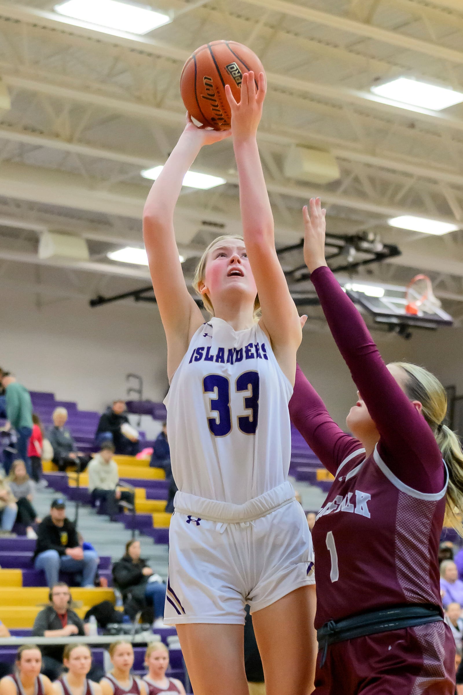 Grand Island High School's Emmy Ward shoots during a girls high school basketball game against Norfolk High School, Jan. 26, 2024 in Grand Island, Neb. (Jimmy Rash/The Independent via AP)