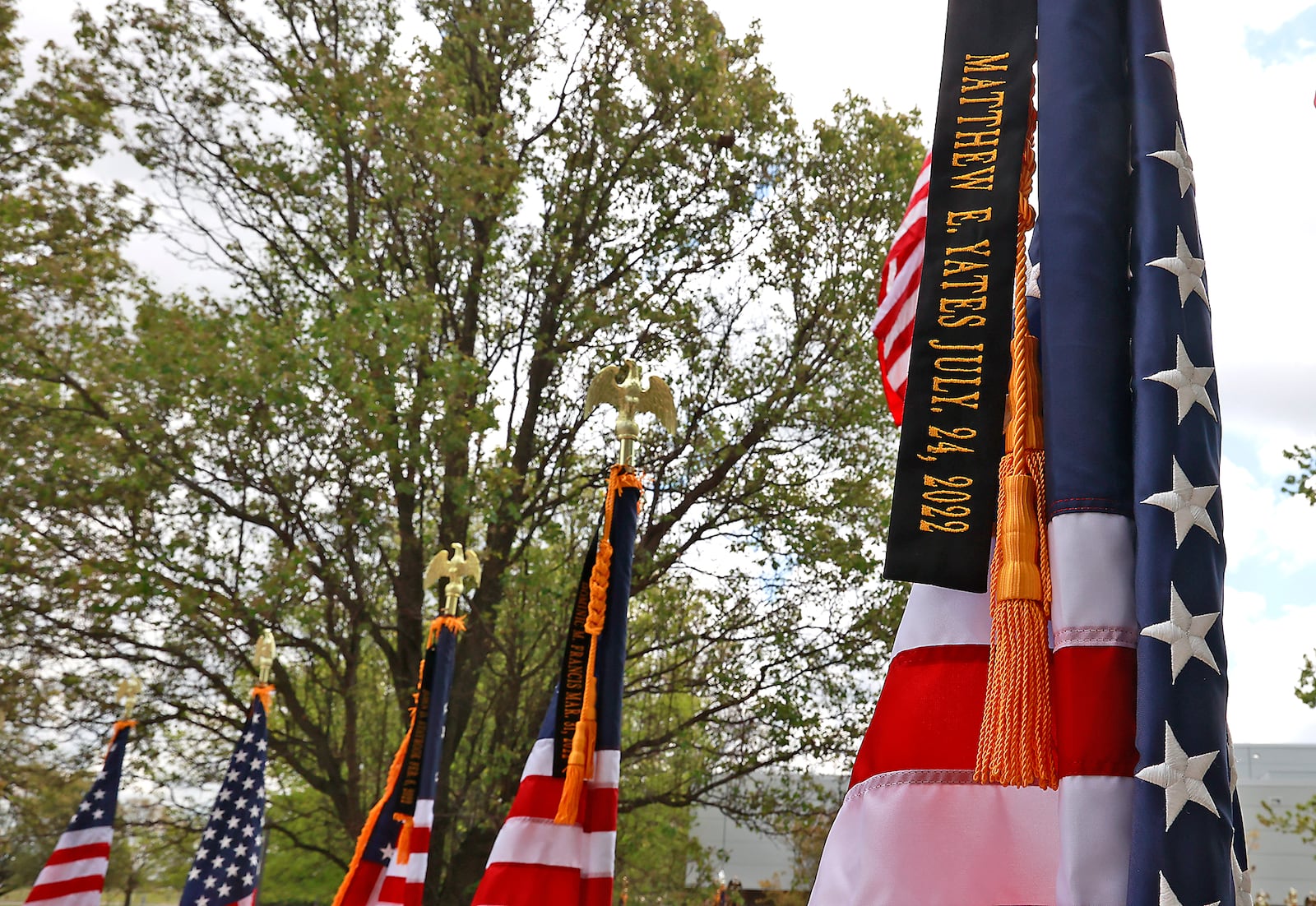 A flag with fallen Clark County Deputy Matthew Yates' name at the Ohio Peace Officers Memorial Ceremony Thursday, May 4, 2023. BILL LACKEY/STAFF