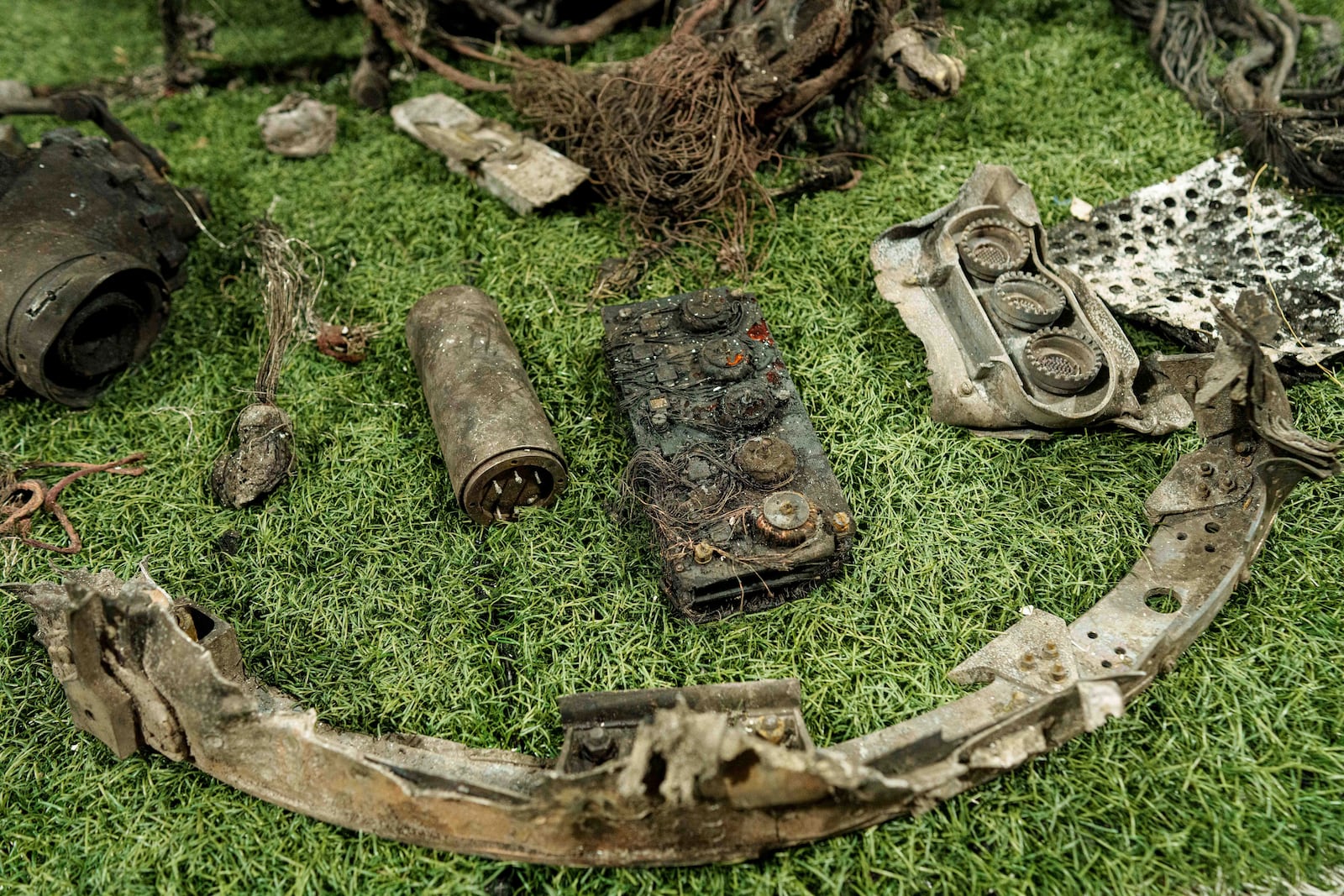 Fragments of a rocket which struck Dnipro on November 21 are seen at a center for forensic analysis in undisclosed location, Ukraine, Sunday Nov. 24, 2024. (AP Photo/Evgeniy Maloletka)