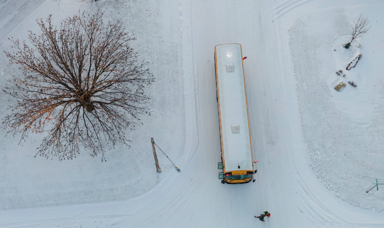 Students board a USD265 school bus on Wednesday, Jan. 8, 2025 in Wichita, Kan. (Jaime Green/The Wichita Eagle via AP)