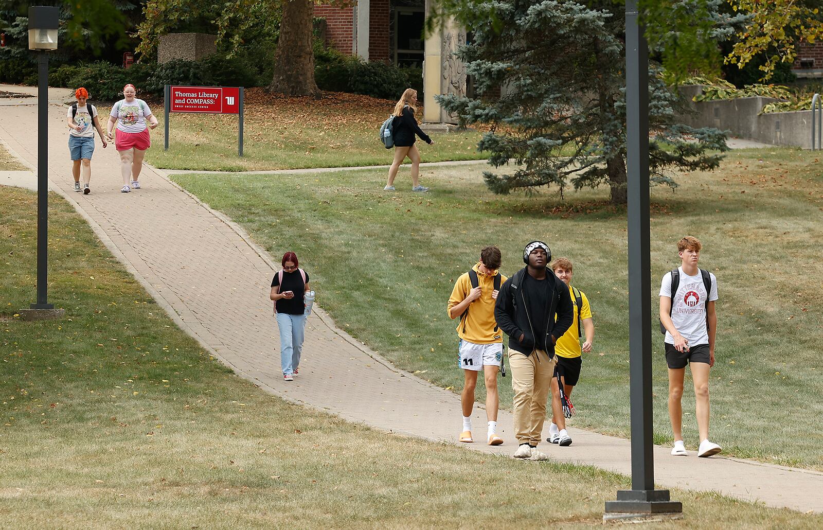 Students walk across the Wittenberg University campus Friday, Sept. 6, 2024. BILL LACKEY/STAFF