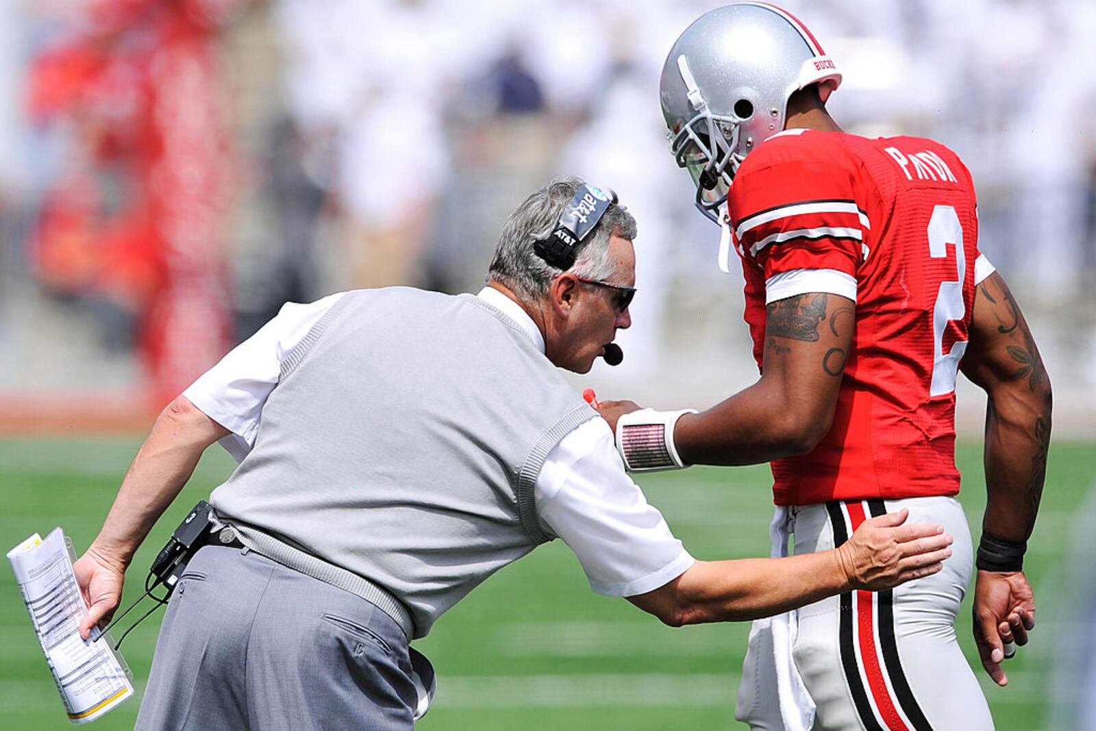 COLUMBUS, OH - SEPTEMBER 05:  Head coach Jim Tressel of the Ohio State Buckeyes congratulates his quarterback Terrelle Pryor #2 after the Buckeyes added another touchdown against the Navy Midshipmen at Ohio Stadium on September 5, 2009 in Columbus, Ohio. Ohio State defeated Navy 31-27. (Photo by Jamie Sabau/Getty Images)