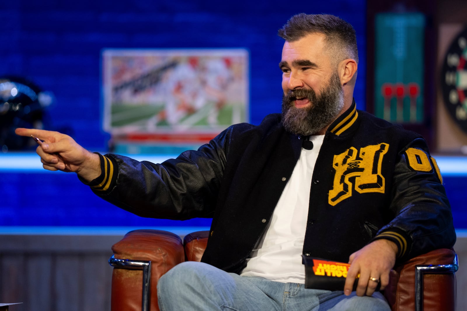 Former NFL player and ESPN analyst Jason Kelce laughs during the taping of "They Call It Late Night with Jason Kelce", Friday, Jan. 3, 2025, in Philadelphia. (AP Photo/Chris Szagola)