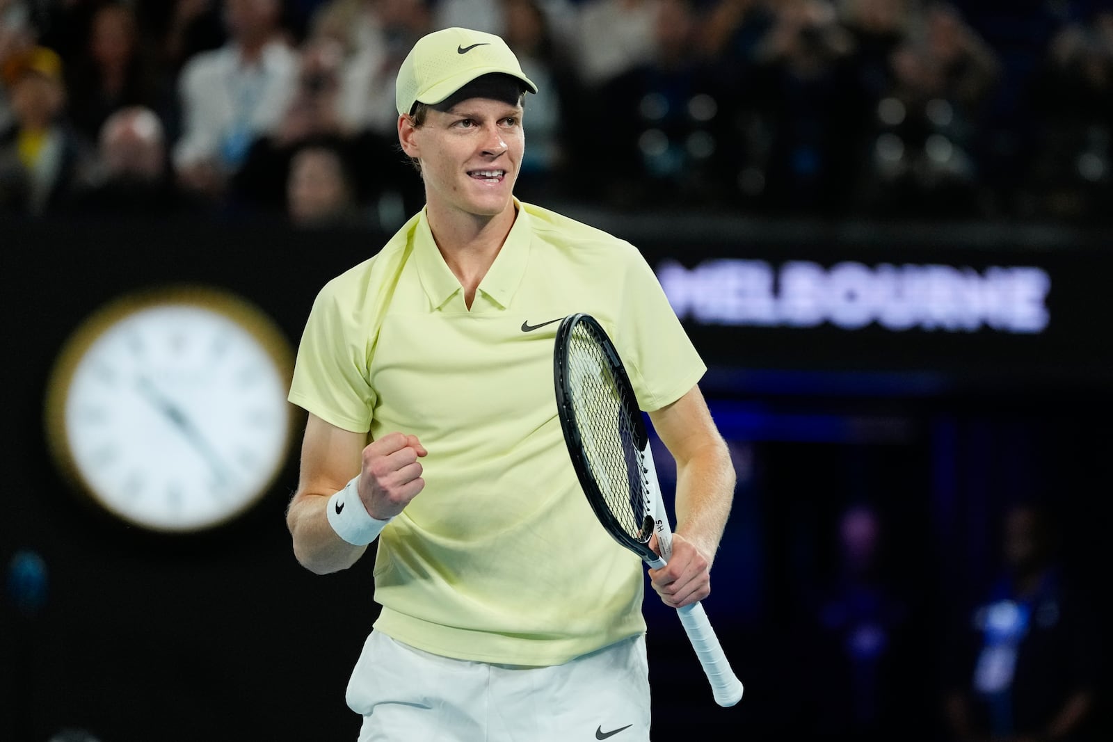 Jannik Sinner of Italy celebrates after defeating Ben Shelton of the U.S. in their semifinal match at the Australian Open tennis championship in Melbourne, Australia, Friday, Jan. 24, 2025. (AP Photo/Ng Han Guan)