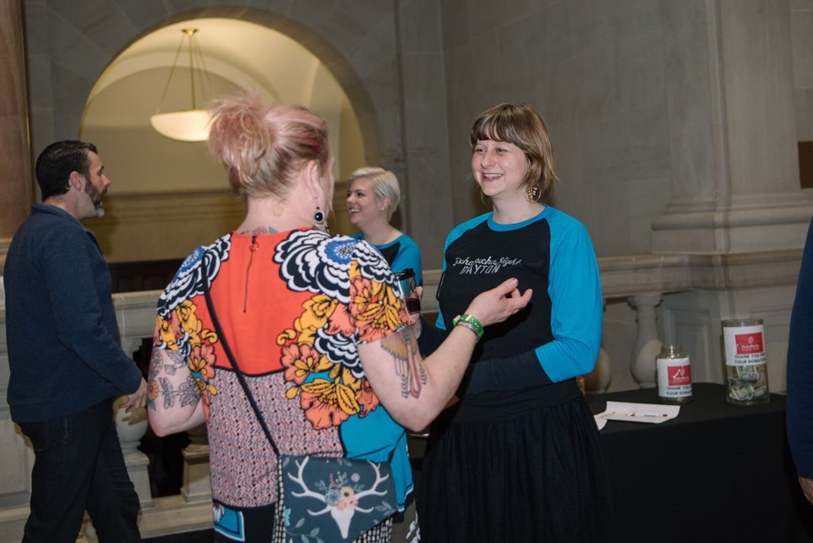 Shayna McConville, a PechaKucha volunteer, chats at intermission. CONTRIBUTED