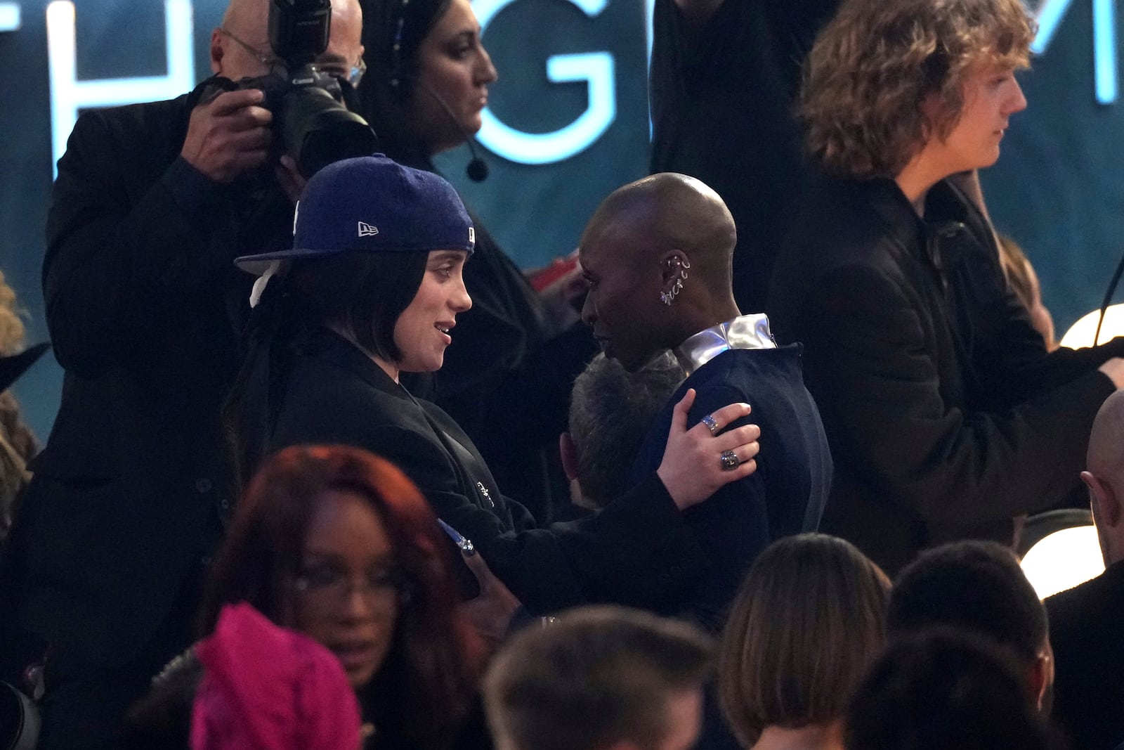 Billie Eilish, left, and Cynthia Erivo embrace in the audience during the 67th annual Grammy Awards on Sunday, Feb. 2, 2025, in Los Angeles. (AP Photo/Chris Pizzello)