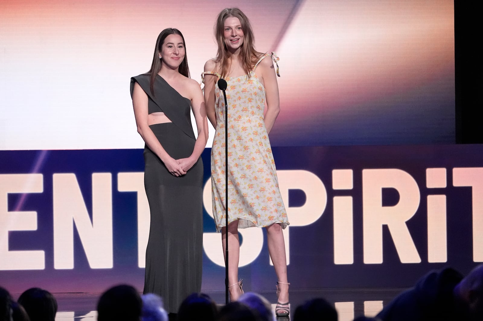 Alana Haim, left, and Hunter Schafer present the award for best supporting performance in a new scripted series during the Film Independent Spirit Awards on Saturday, Feb. 22, 2025, in Santa Monica, Calif. (AP Photo/Chris Pizzello)