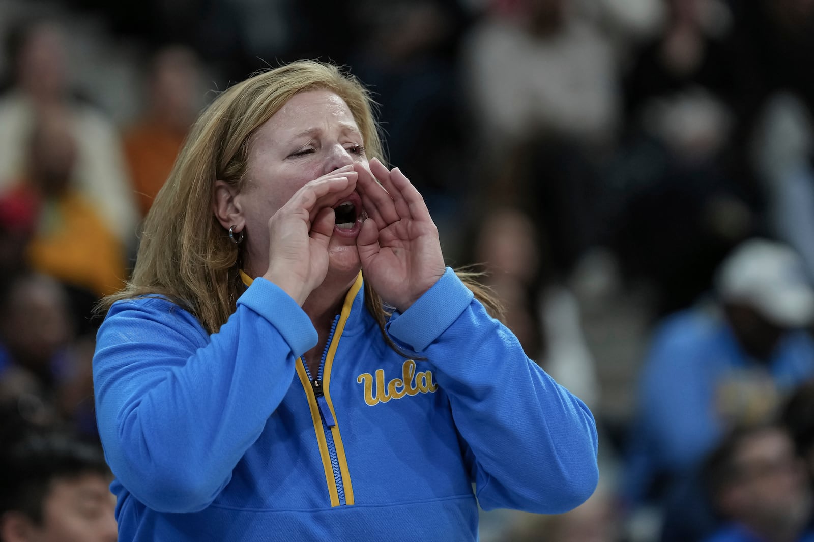 UCLA coach Cori Close reacts during an NCAA college basketball game against Louisville, Monday, Nov. 4, 2024, in Paris, France. (AP Photo/Aurelien Morissard)