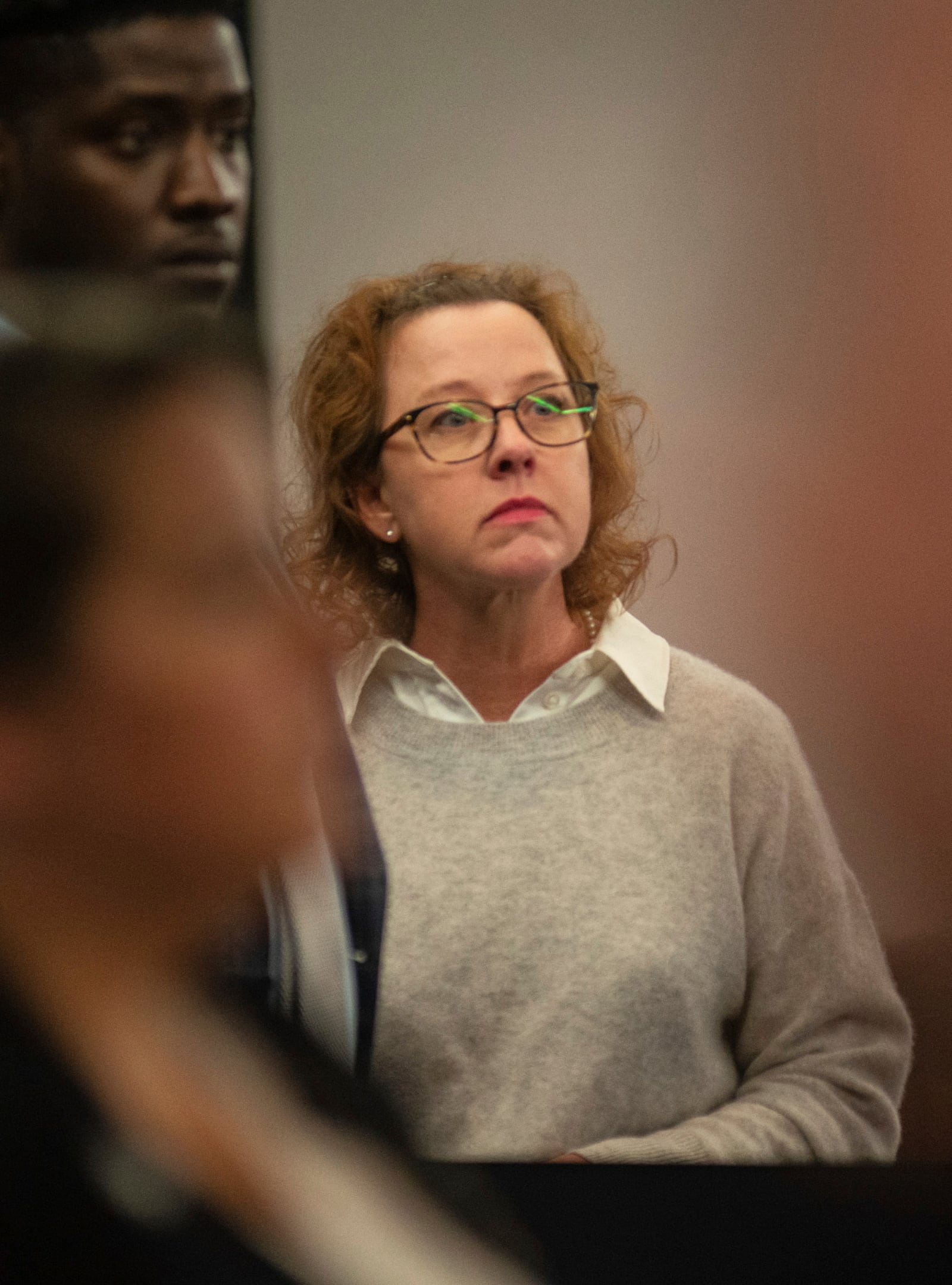 Former Brunswick Circuit District Attorney Jackie Johnson stands in the courtroom after a judge dismissed a charge that she had violated her oath of office, Wednesday, Feb. 5, 2025, in Brunswick, Ga. (Terry Dickson/The Brunswick News via AP, Pool)