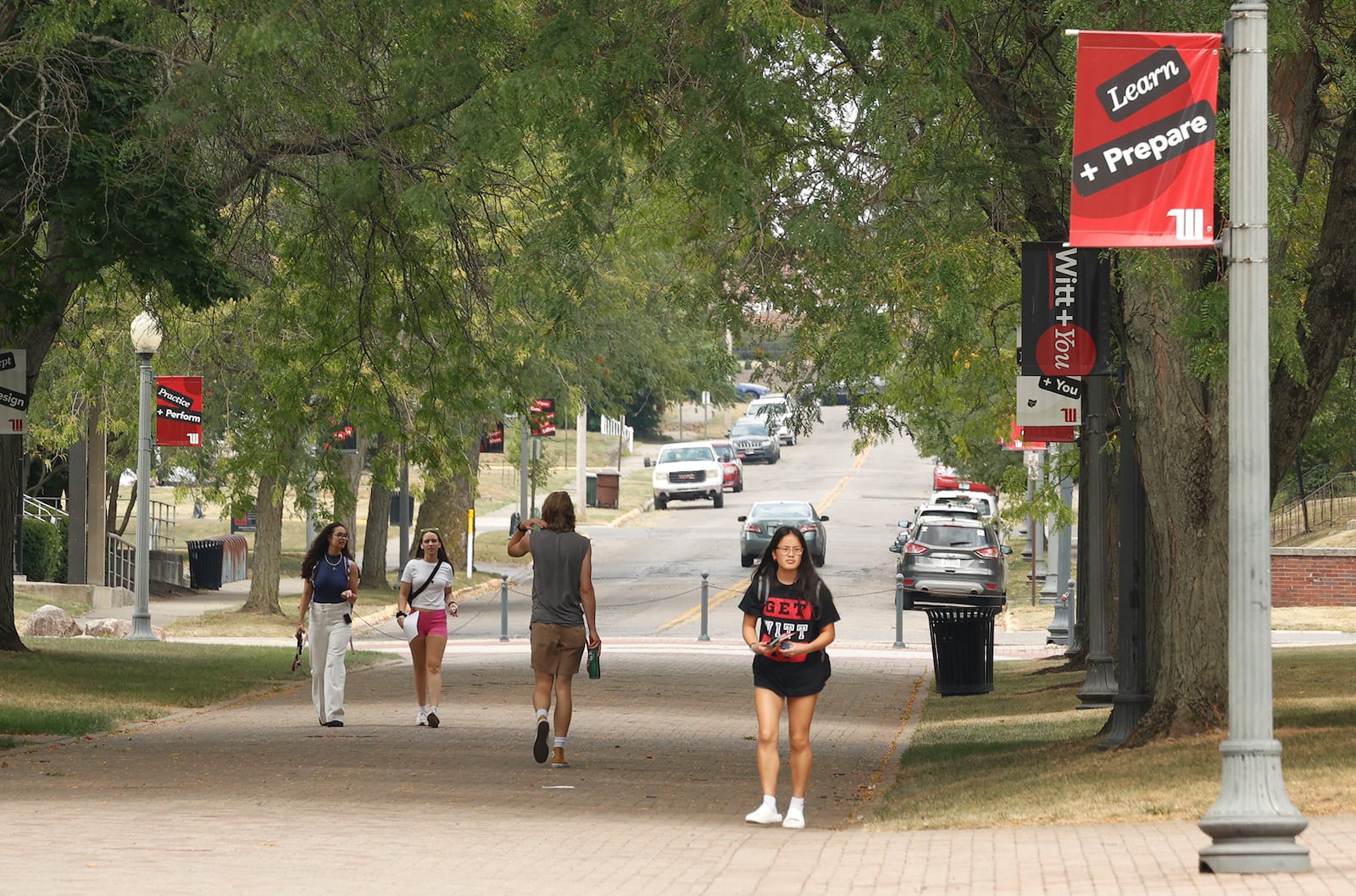 Students walk across the Wittenberg University campus Friday, Sept. 6, 2024. BILL LACKEY/STAFF