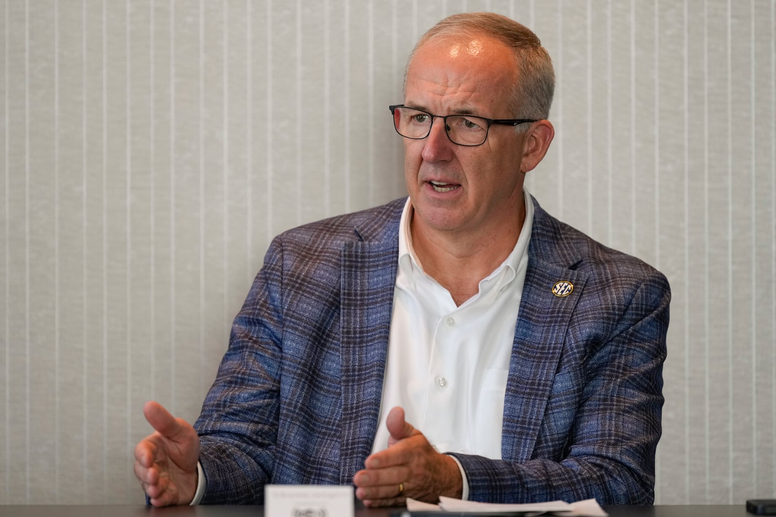 Southeastern Conference commissioner Greg Sankey speaks during a news conference after meetings between the SEC and Big Ten Conference, Thursday, Oct. 10, 2024, in Nashville, Tenn. (AP Photo/George Walker IV)