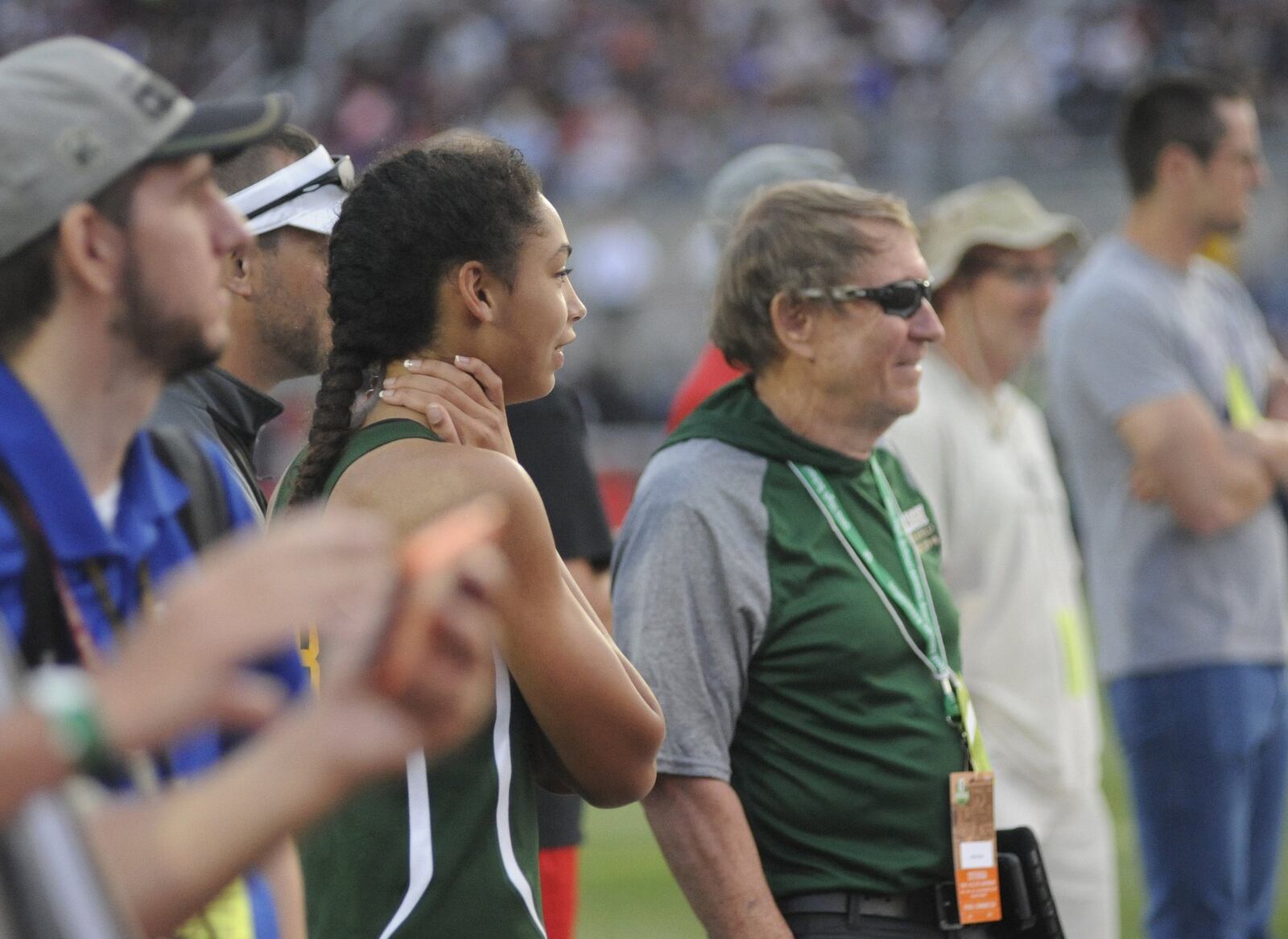 Catholic Central freshman Mallory Mullen, with coach Mark Klopfenstein, won the D-III state high jump at OSU’s Jesse Owens Memorial Stadium in Columbus on Friday, May 31, 2019. MARC PENDLETON / STAFF