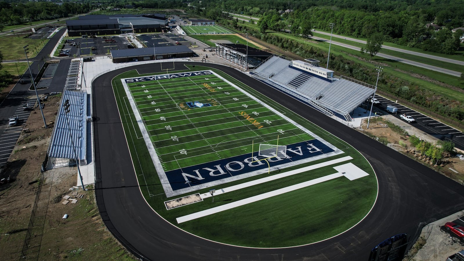 The new $95 million Fairborn High School on Commerce Center Boulevard is nearly complete. The school is set to open in August with the new school year. JIM NOELKER/STAFF