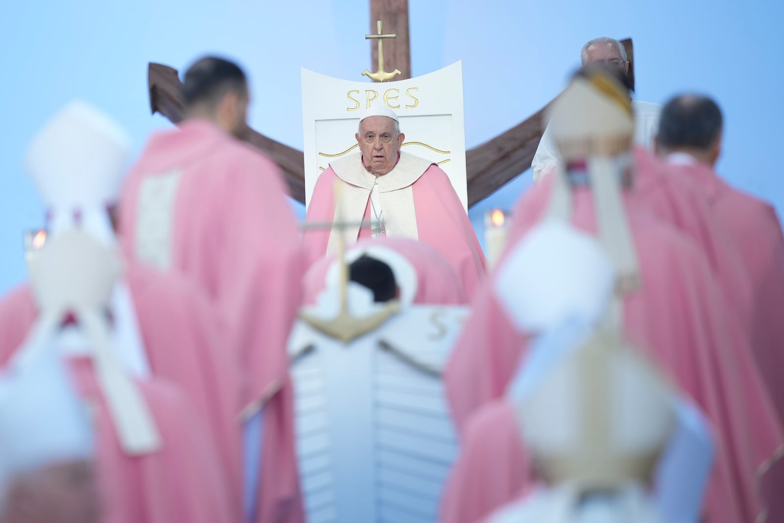 Pope Francis presides over a mass in Ajaccio "Place d'Austerlitz" during his visit in the French island of Corsica, Sunday, Dec. 15, 2024. (AP Photo/Alessandra Tarantino)