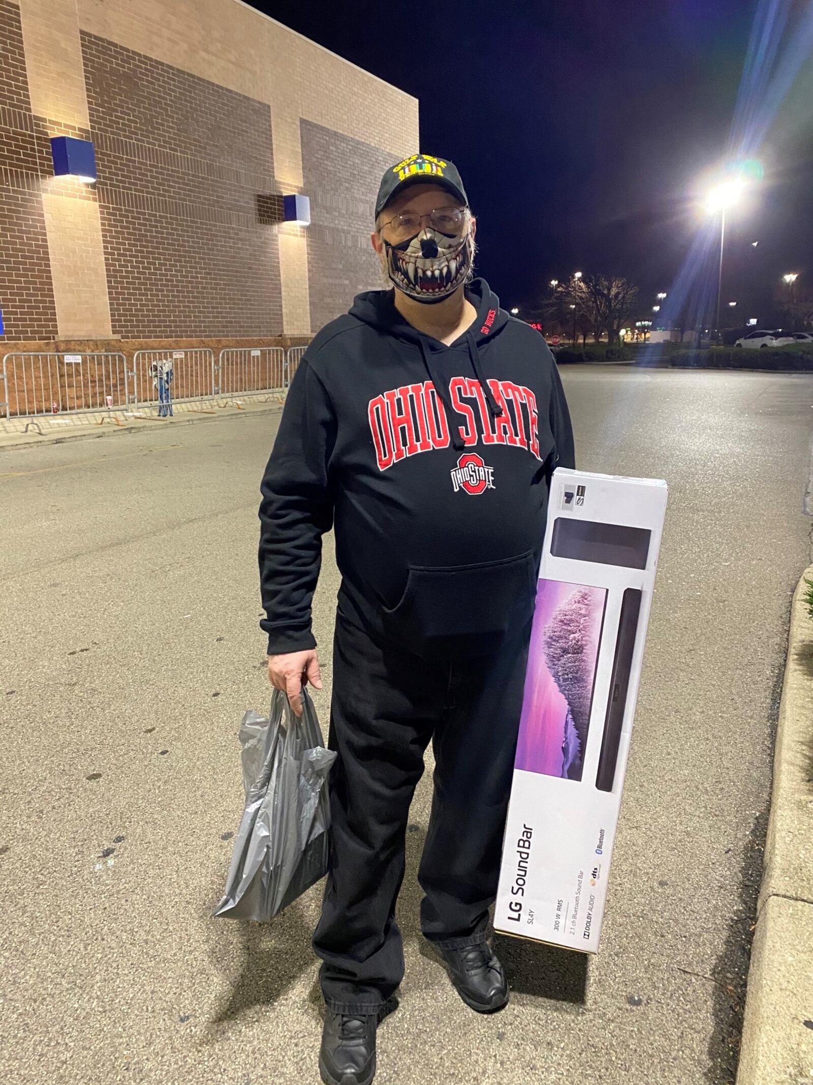 David Huff with gifts he bought at the Best Buy on Centre Drive in Fairborn | Eileen McClory