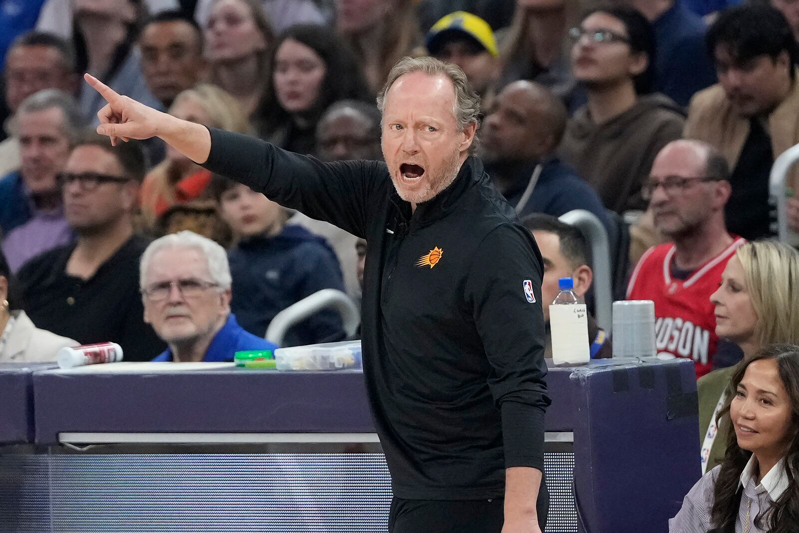 Phoenix Suns head coach Mike Budenholzer gestures toward players during the first half of an NBA basketball game against the Golden State Warriors in San Francisco, Friday, Jan. 31, 2025. (AP Photo/Jeff Chiu)