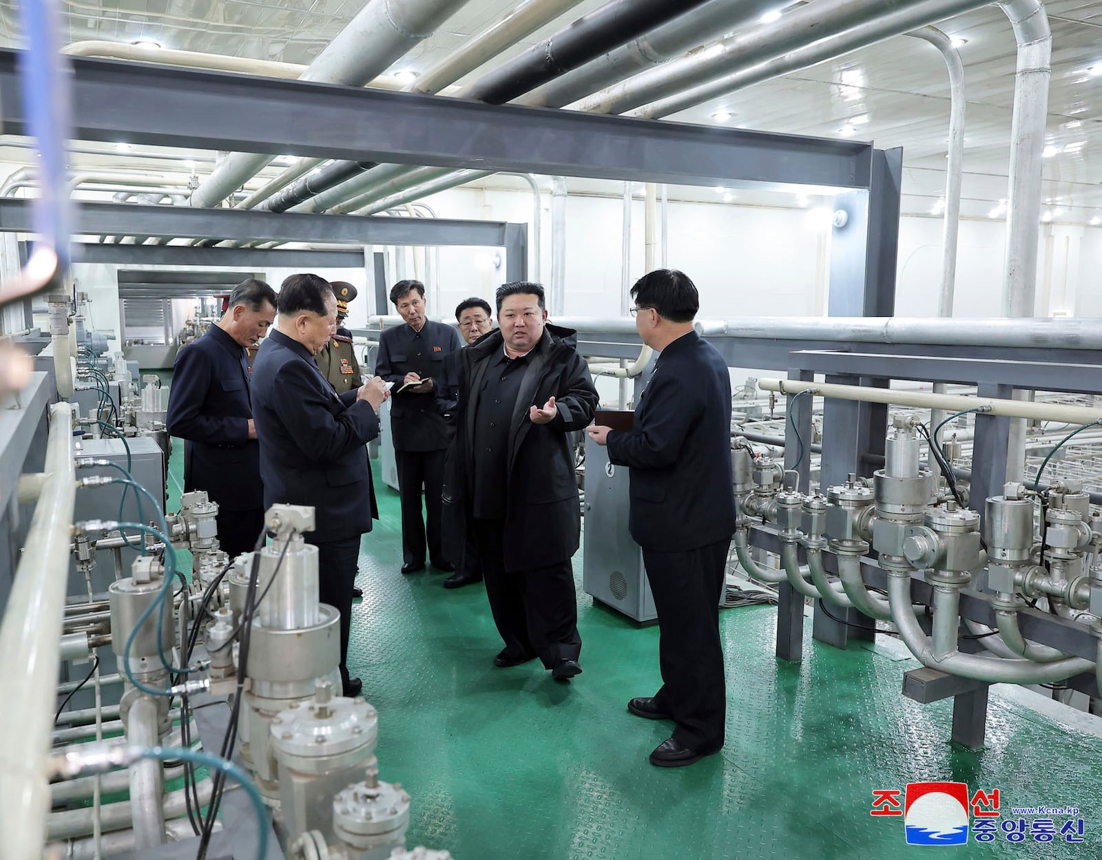 In this undated photo provided Wednesday, Jan. 29, 2025, by the North Korean government, its leader Kim Jong Un, second right, inspects a facility that produces nuclear material at an undisclosed location in North Korea. Independent journalists were not given access to cover the event depicted in this image distributed by the North Korean government. The content of this image is as provided and cannot be independently verified. Korean language watermark on image as provided by source reads: "KCNA" which is the abbreviation for Korean Central News Agency. (Korean Central News Agency/Korea News Service via AP)