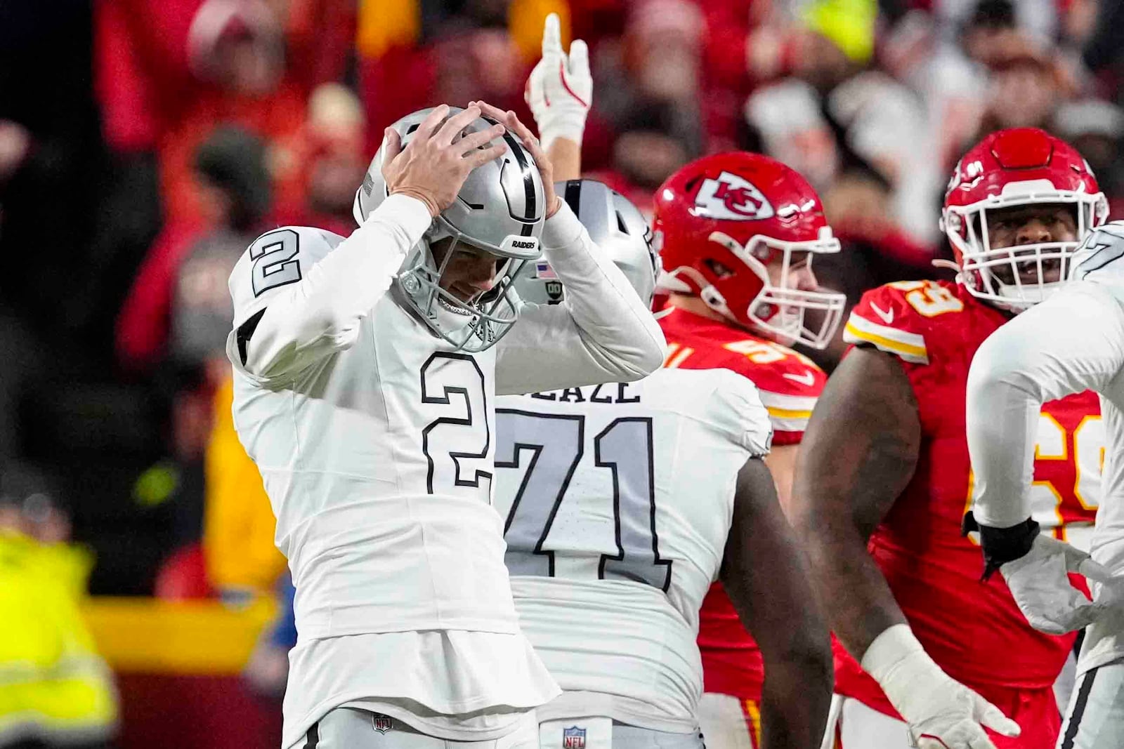 Las Vegas Raiders place kicker Daniel Carlson (2) reacts after missing a field goal late in the fourth quarter against the Kansas City Chiefs in an NFL football game in Kansas City, Mo., Friday, Nov. 29, 2024. (AP Photo/Ed Zurga)