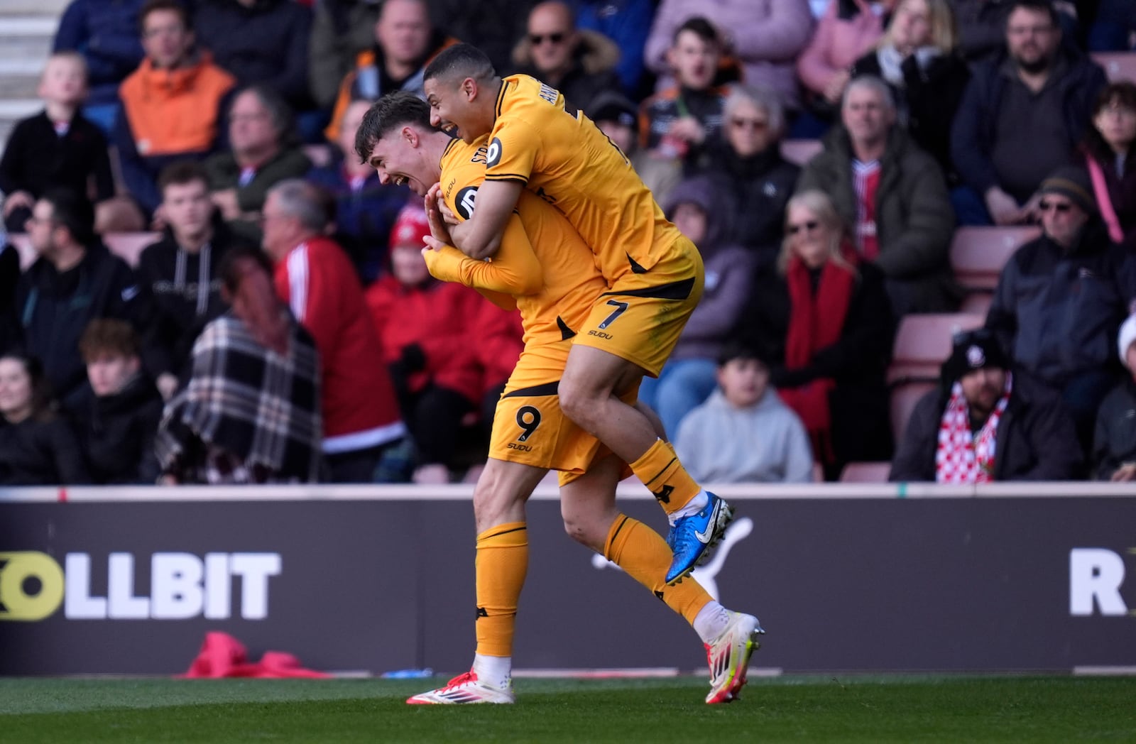 Wolverhampton Wanderers' Jorgen Strand Larsen, left, celebrates scoring their side's second goal of the game during the English Premier League soccer match between Southampton and Wolverhampton Wanderers at St. Mary's Stadium, Southampton, England, Saturday, March 15, 2025. (Andrew Matthews/PA via AP)