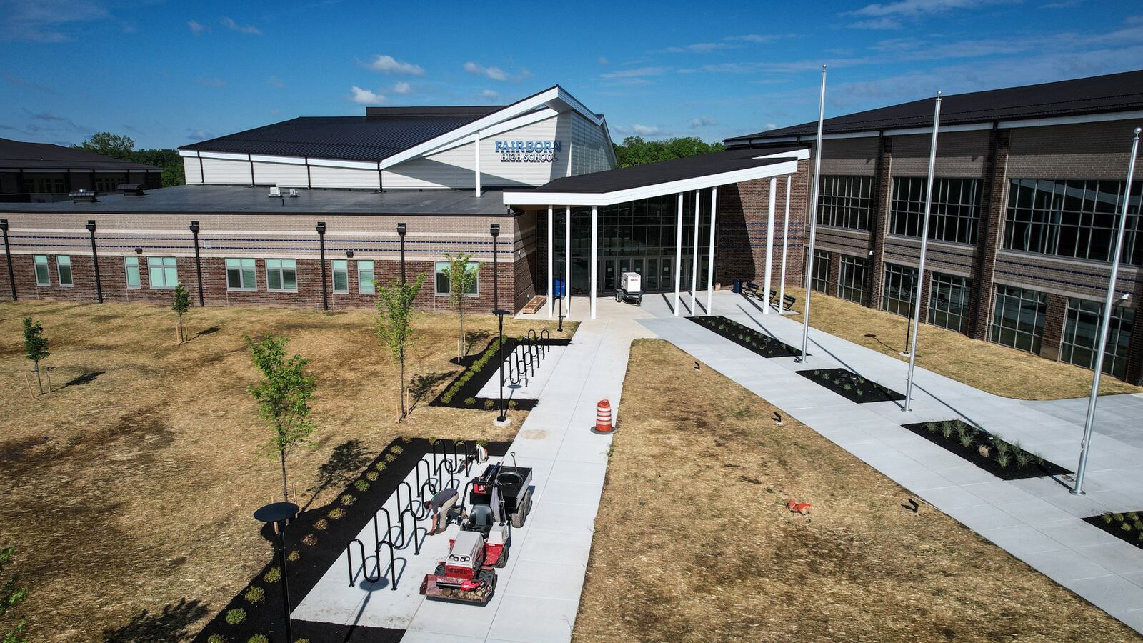 The new $95 million Fairborn High School on Commerce Center Boulevard is nearly complete. The school is set to open in August with the new school year. JIM NOELKER/STAFF