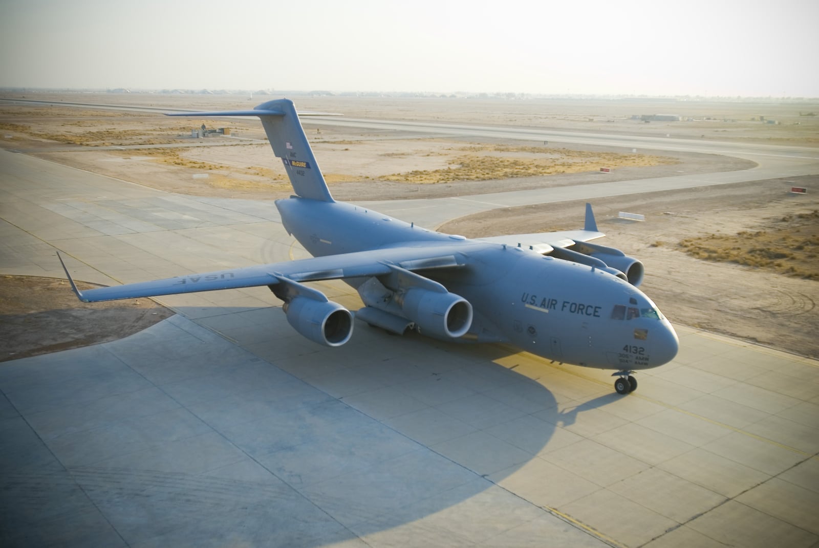 C-17 Globemaster III taxis to the ramp at Balad Air Base.  The aircraft can perform tactical air lift and air drop missions and can also transport litters and ambulatory patients during aeromedical evacuations during Operations Enduring and Iraqi Freedom.