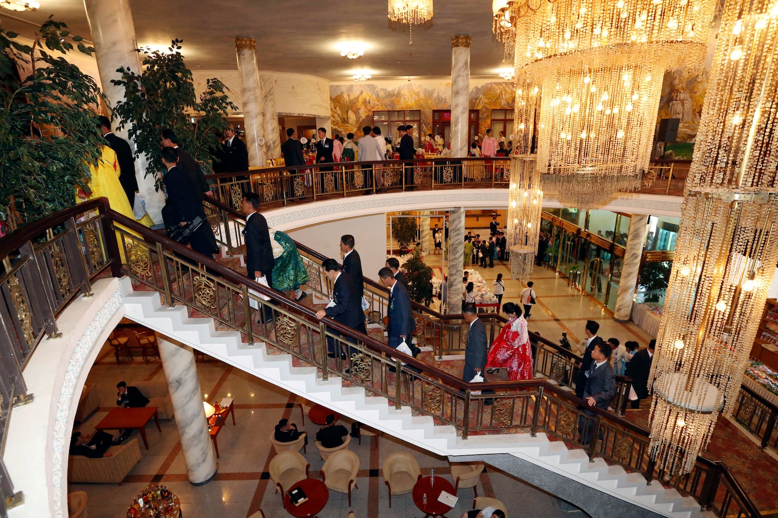 FILE - North Koreans arrive to meet their South Korean relatives during a separated family reunion meeting at the Diamond Mountain resort in North Korea, Tuesday, Aug. 21, 2018. (Korea Pool Photo via AP, File)