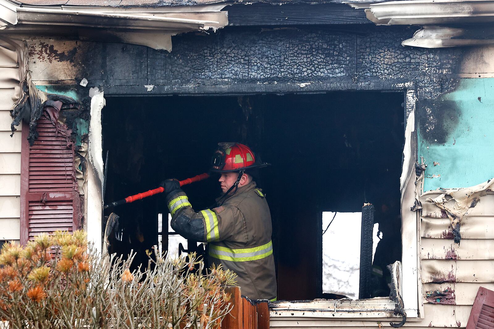 A fire caused extensive damage to a house in the 2000 block of Leland Drive Friday, Feb. 2, 2024. The Springfield Fire Division arrived to find smoke and flames coming from the front and right side of the structure. The house was a vacant rental property and the Fire Marshall was called to determine a cause for the fire. The fire department was able to keep the fire from damaging the surrounding houses. BILL LACKEY/STAFF