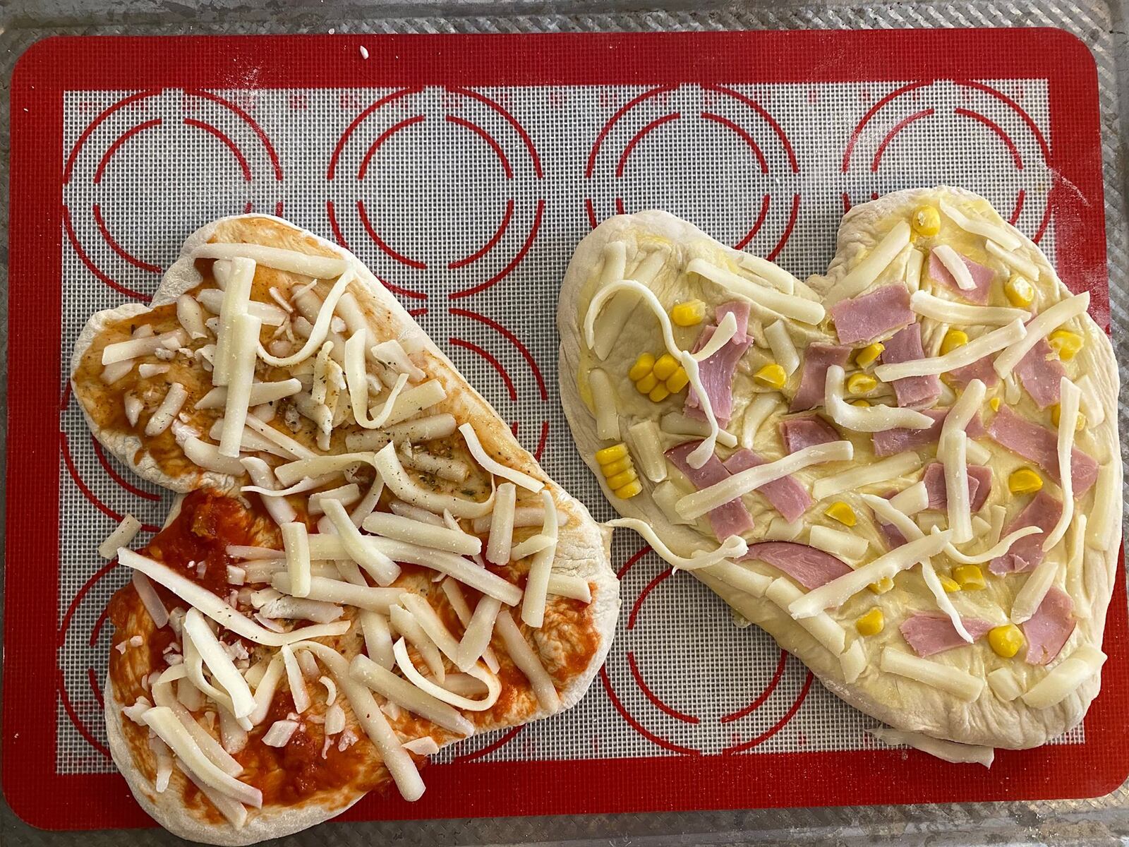 The pizzas the Deal kids made themselves before they went into the oven. CONTRIBUTED