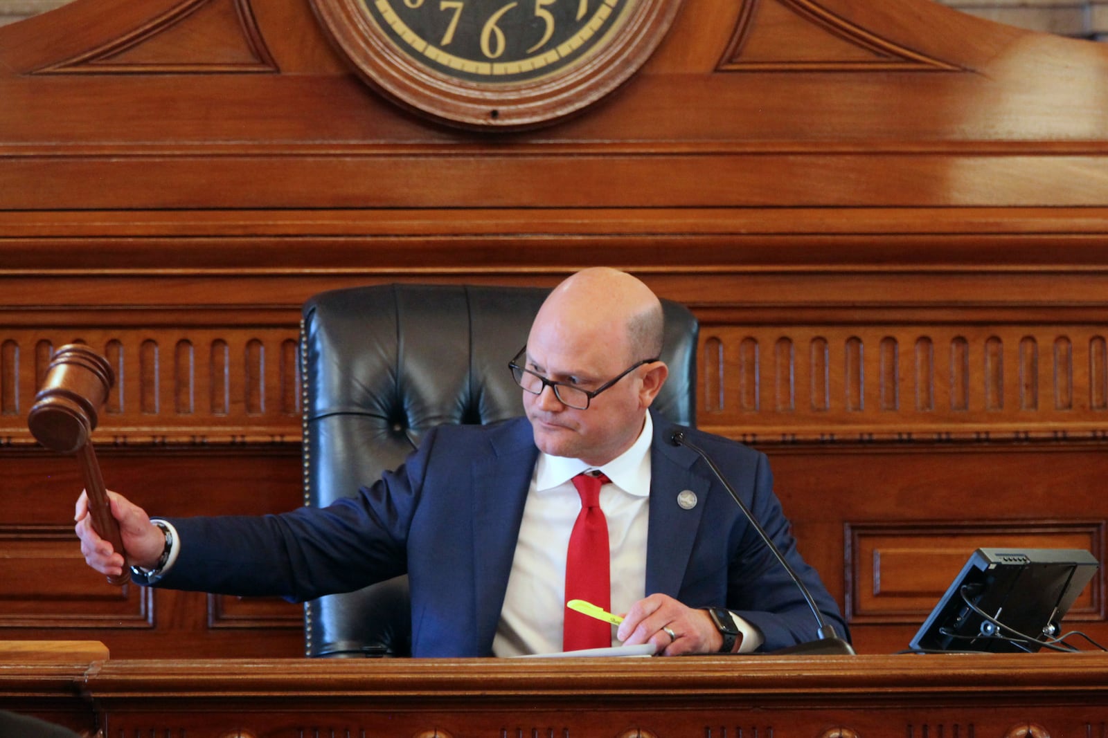 Kansas Secretary of State Scott Schwab gavels a meeting of the state’s presidential electors in the state Senate chamber to a close, Tuesday, Dec. 17, 2024, at the Statehouse in Topeka, Kan. Schwab championed a proof-of-citizenship requirement for new voters as a legislator but now says states shouldn’t enact one. (AP Photo/John Hanna)