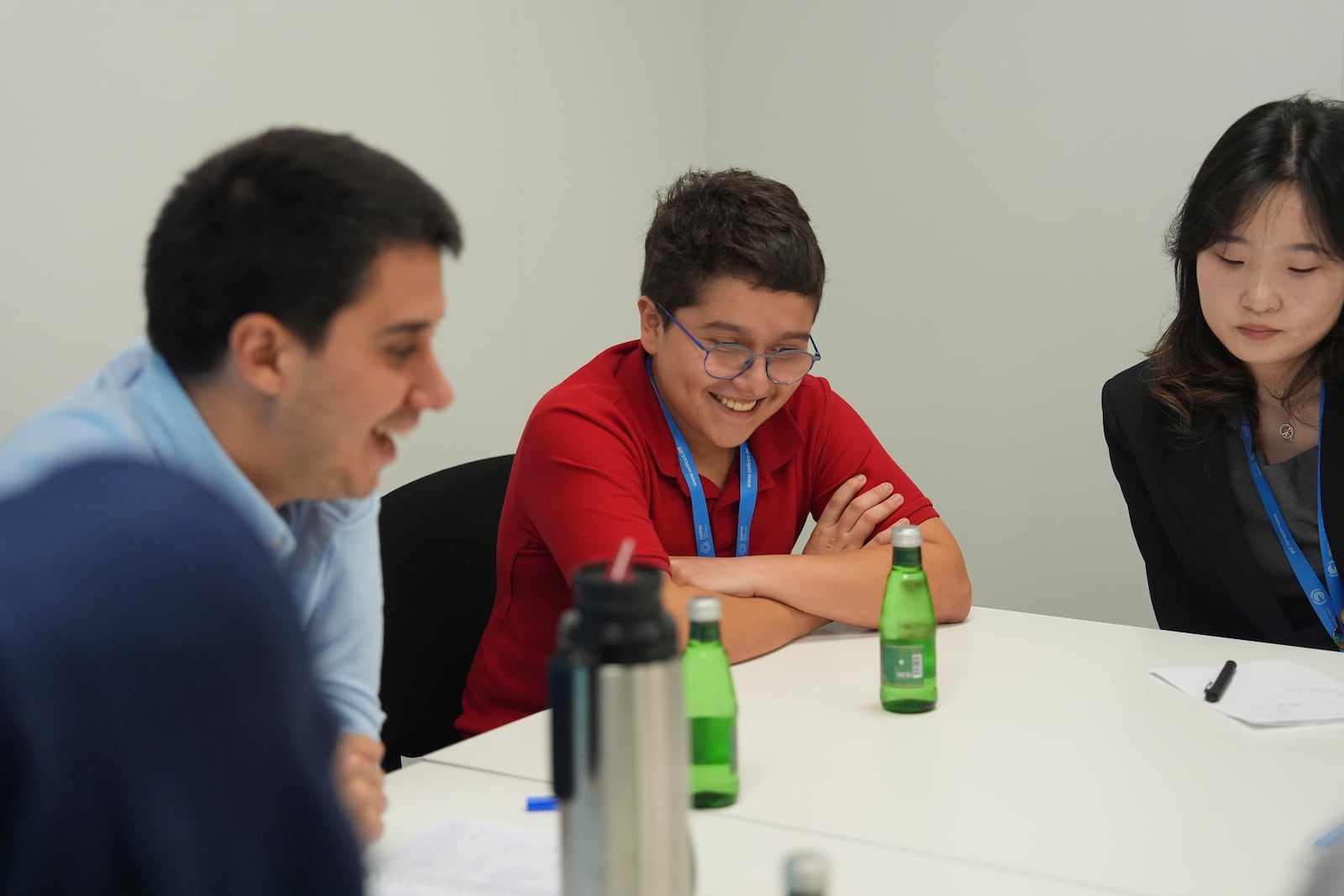 Francisco Vera Manzanares, 15, center, a climate activist from Colombia, reacts while listening during a forum with young activists, Tuesday, Nov. 12, 2024, at the COP29 U.N. Climate Summit in Baku, Azerbaijan. (AP Photo/Joshua A. Bickel)