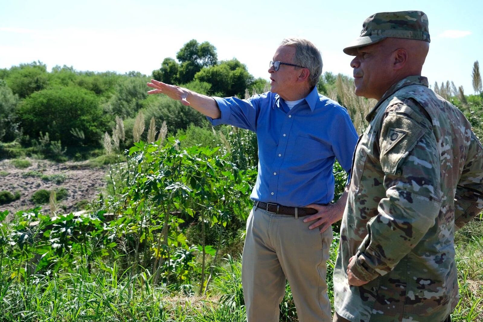 Ohio Gov. Mike DeWine meets with Maj. Gen. John Harris Jr., who heads the Ohio National Guard, at the border in Texas.