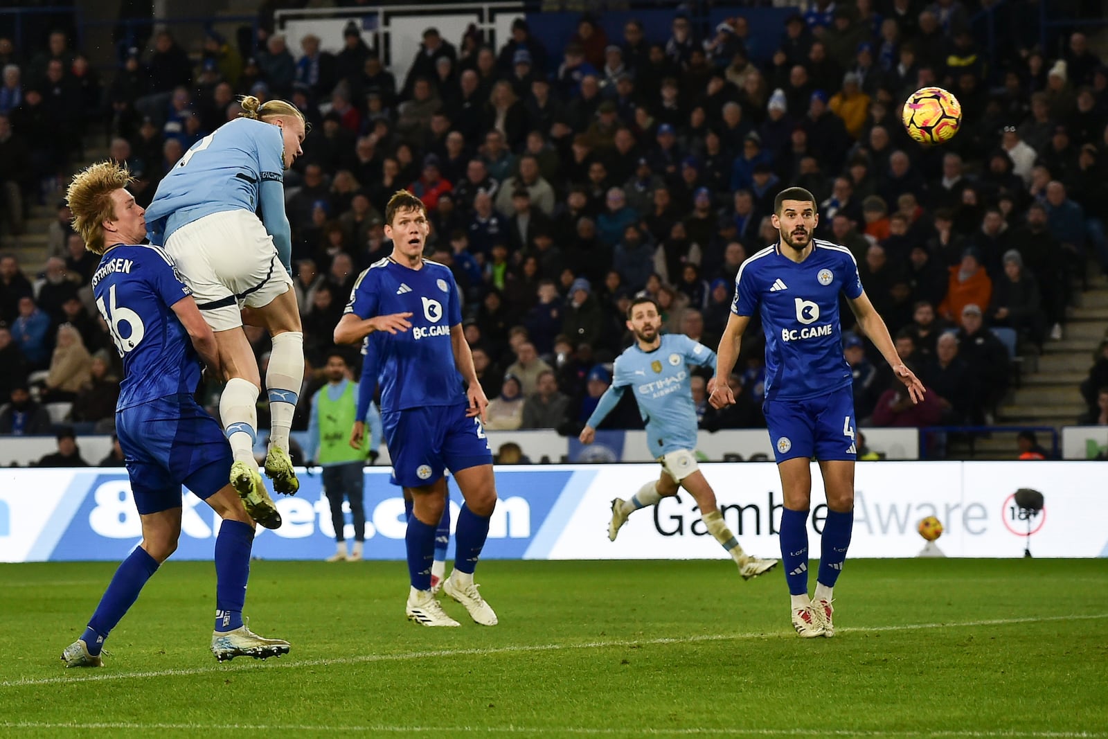 Manchester City's Erling Haaland, second left, scores his side's second goal during the English Premier League soccer match between Leicester City and Manchester City at King Power stadium in Leicester, England, Sunday, Dec. 29, 2024. (AP Photo/Rui Vieira)