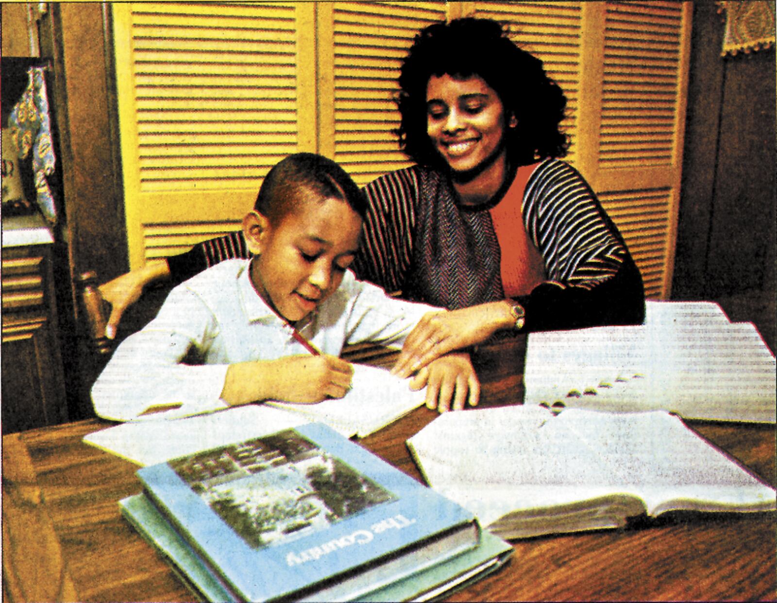 John Stephens, winner of the 1989 District Spelling Bee, is tutored at home by his mother Phyllis.