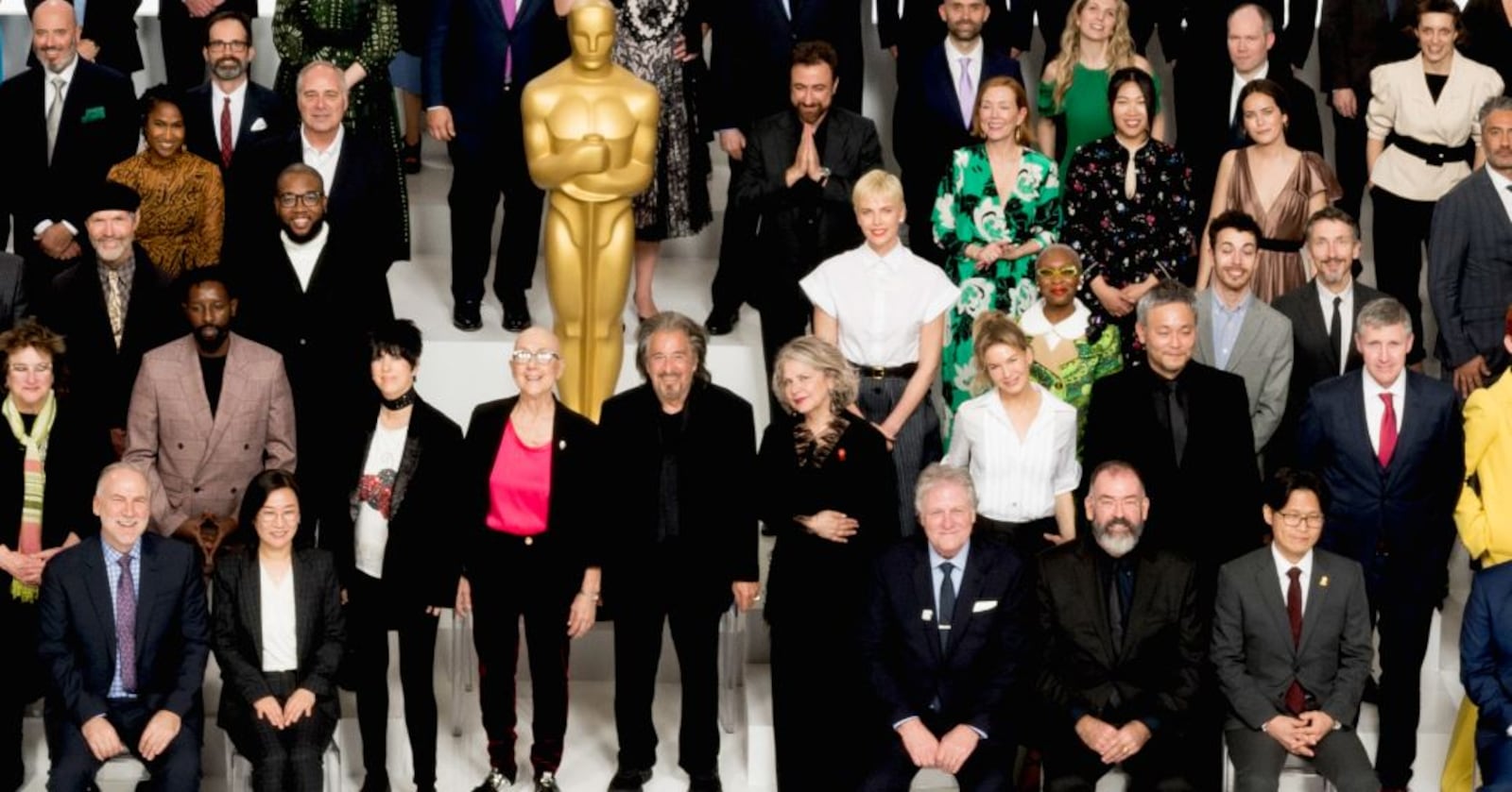 92nd Oscars nominees at the Oscar Nominee Luncheon held at the Ray Dolby Ballroom, Monday, January 27, 2020. The 92nd Oscars will air on Sunday, February 9, 2020 live on ABC. Yellow Springs resident Julia Reichert (pink shirt) stands next to Al Pacino. Actresses  Charlize Theron, Renée Zellweger and  Cynthia Erivo can also be seen in this cropped and zoomed in  photo. Reichert co-directed Oscar nominated film “American Factory” with partner Steve Bognar.