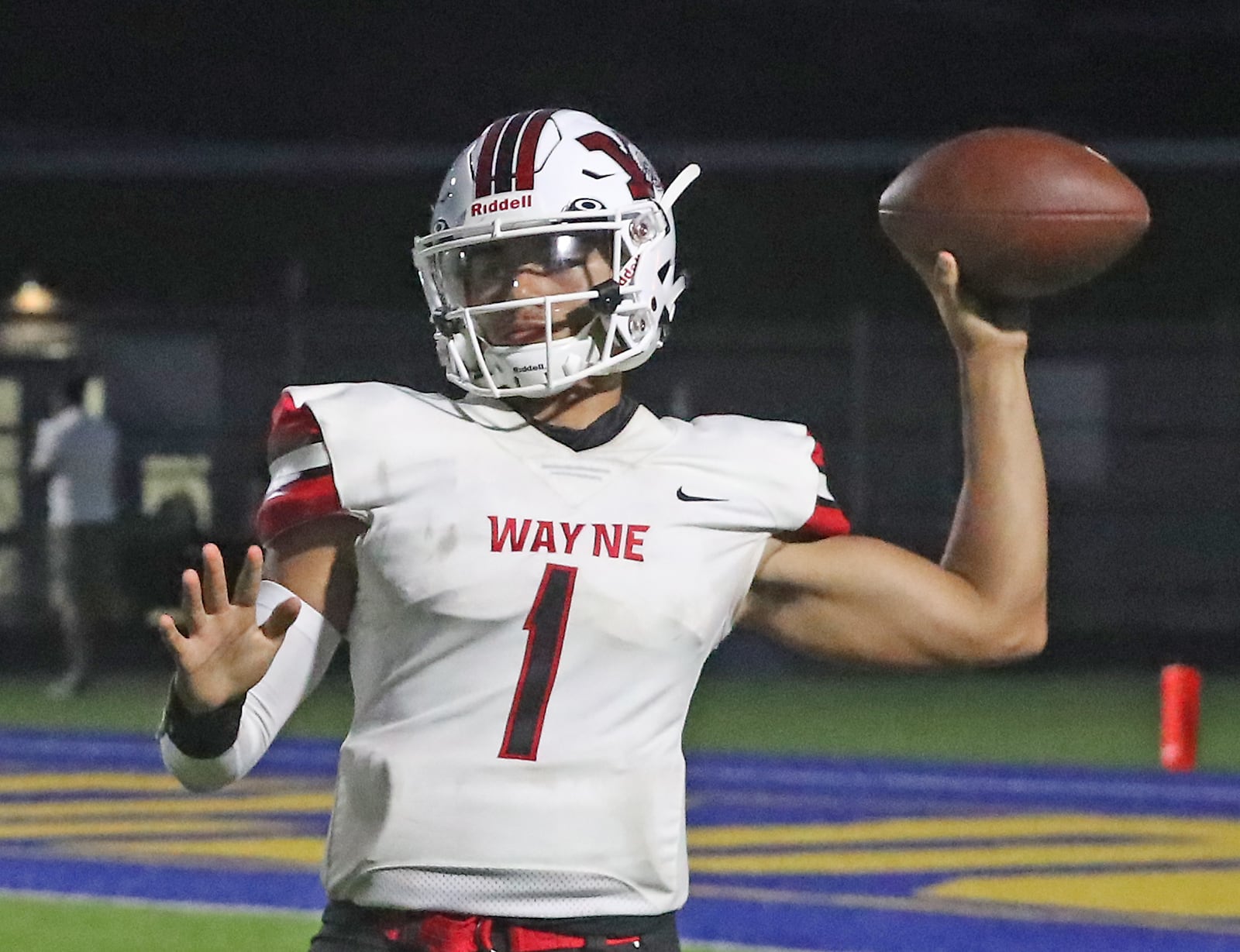 Wayne quarterback Cam Fancher throws a pass against Springfield. BILL LACKEY/STAFF