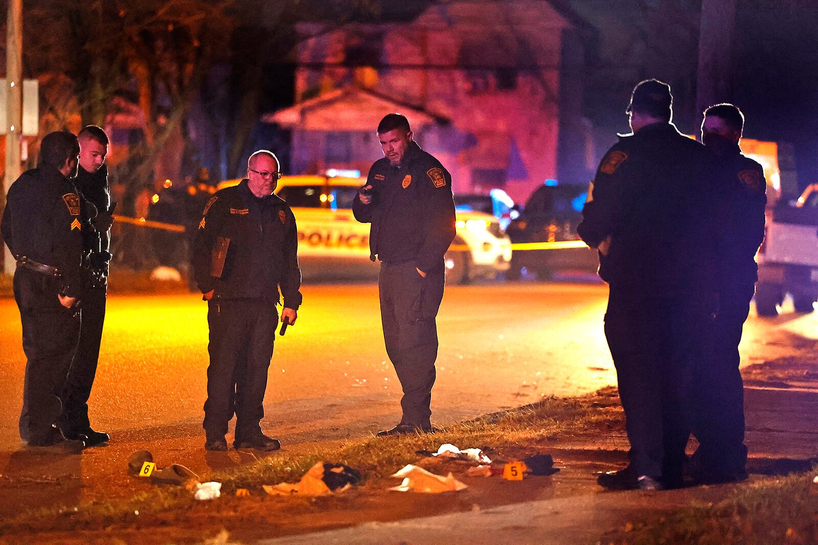 The Springfield Police Division investigates the scene of a shooting along the 600 block of Euclid Avenue Thursday evening, Dec. 21, 2023. According to police they arrived to find a male laying beside the road with a gunshot wound to the head. The victim was transported to Springfield Regional Medical Center and flown by CareFlight to Miami Valley Hospital. BILL LACKEY/STAFF