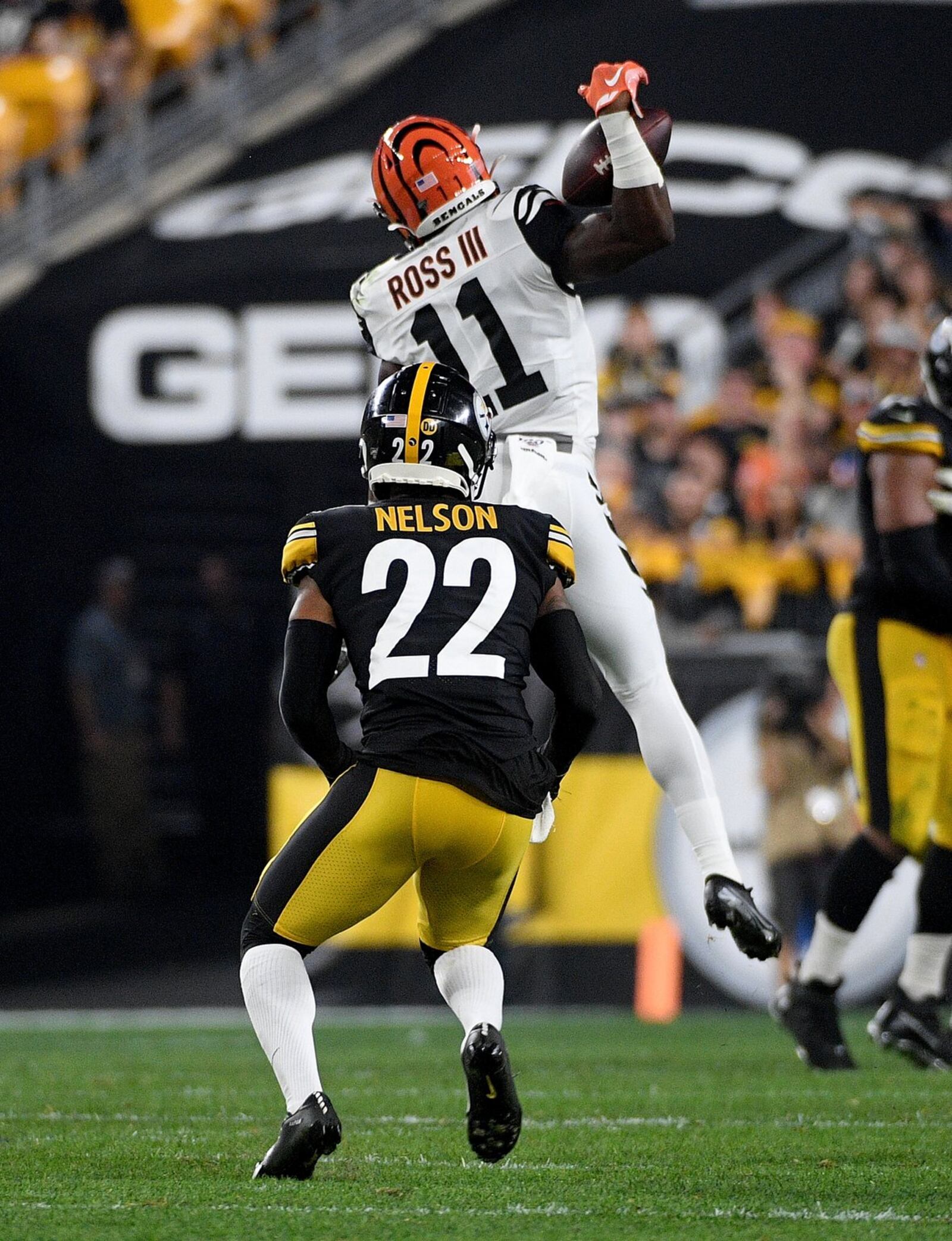 PITTSBURGH, PA - SEPTEMBER 30: John Ross #11 of the Cincinnati Bengals makes a catch as Steven Nelson #22 of the Pittsburgh Steelers defends in the second quarter during the game at Heinz Field on September 30, 2019 in Pittsburgh, Pennsylvania. (Photo by Justin Berl/Getty Images)